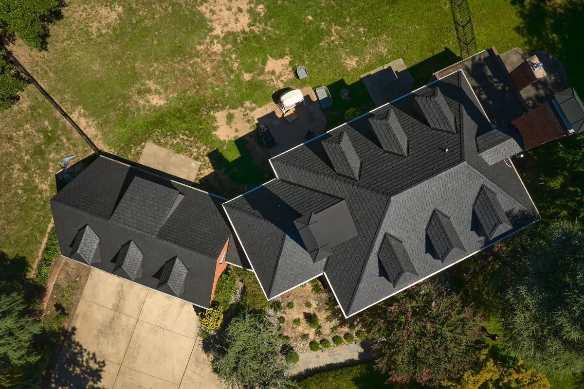 Brava composite synthetic slate roof on a multi-gabled estate home