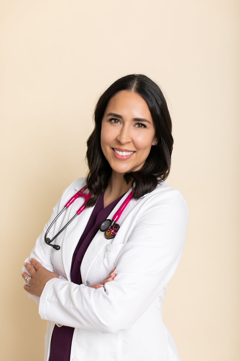 Marisa Martin smiling in a white coat