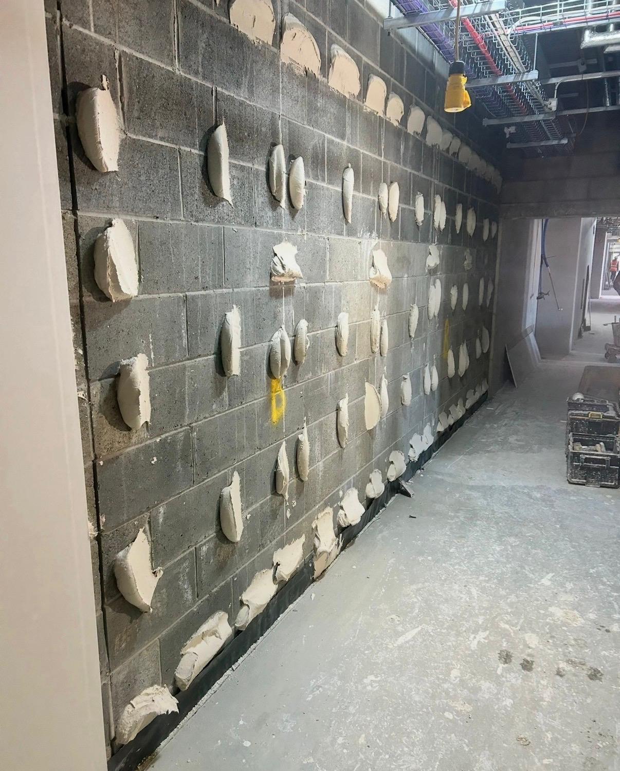 Dot and dab plasterboard fixing by Elite Plastering Contractors Ltd