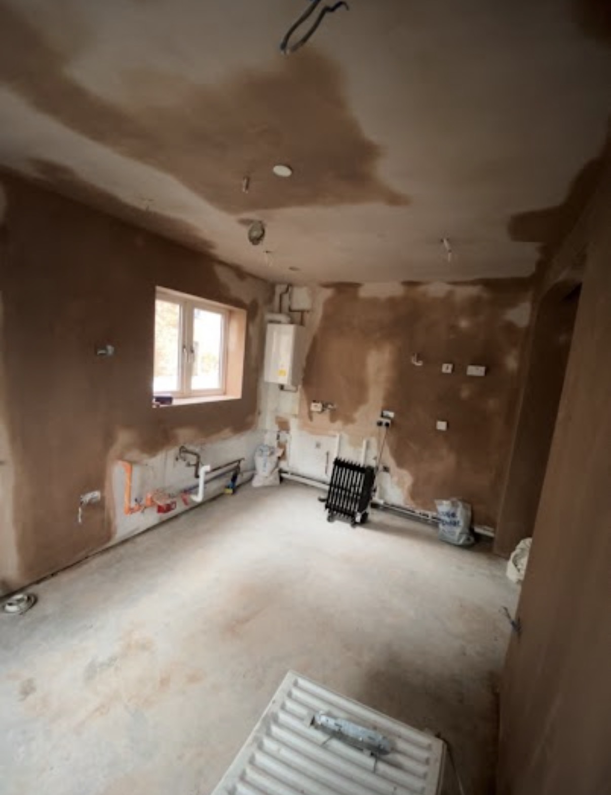 Smooth plastered interior surface by Elite Plastering Contractors Ltd