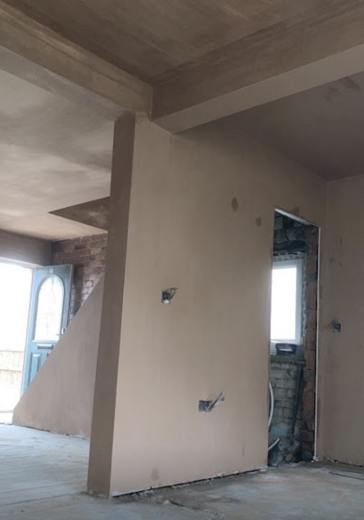 Re-skimming plaster wall in Leeds