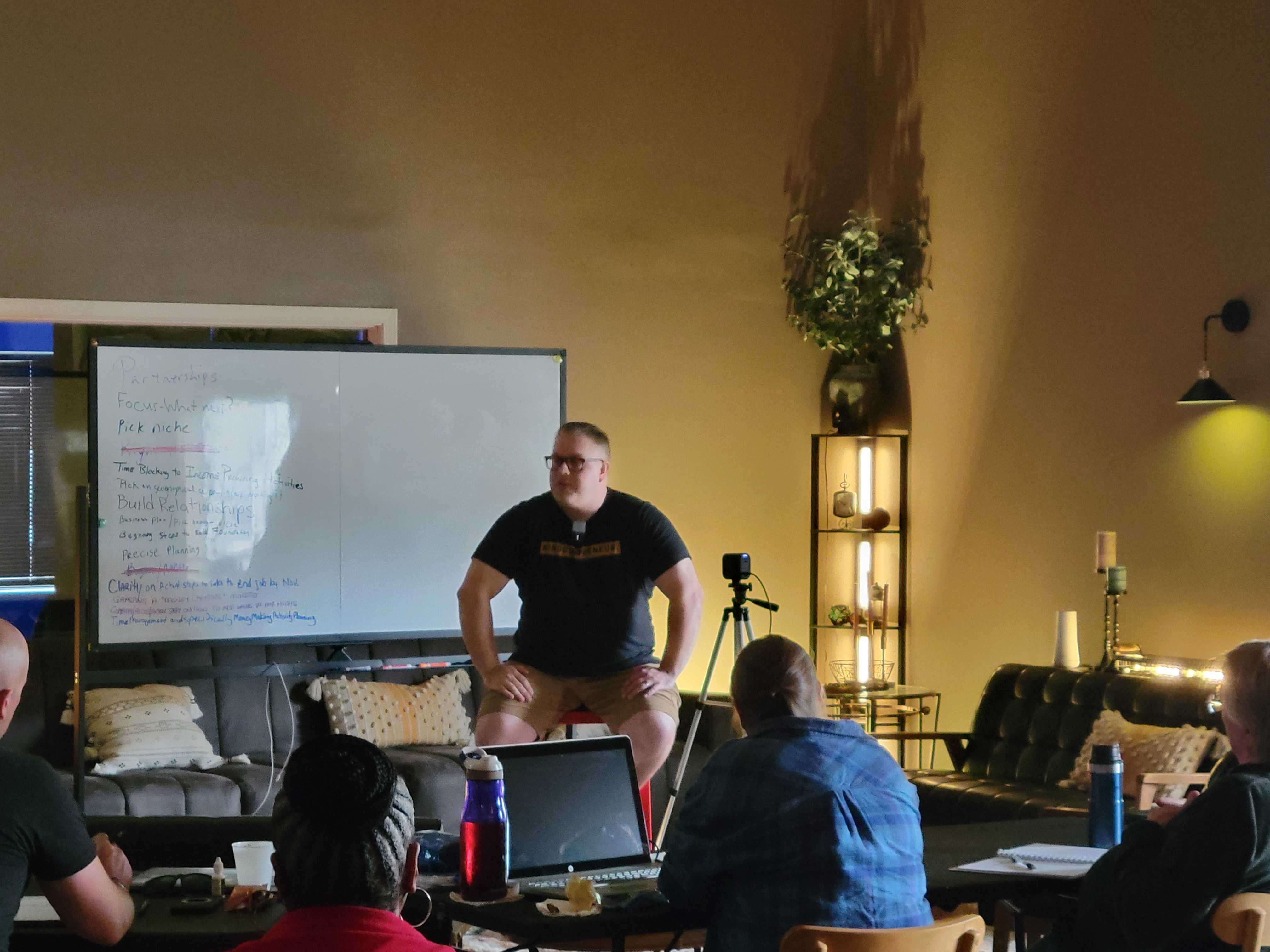 Luke Anderson speaking at a mastermind