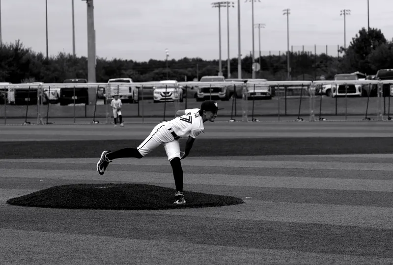 A Florida Hype pitcher follows through off the mound
