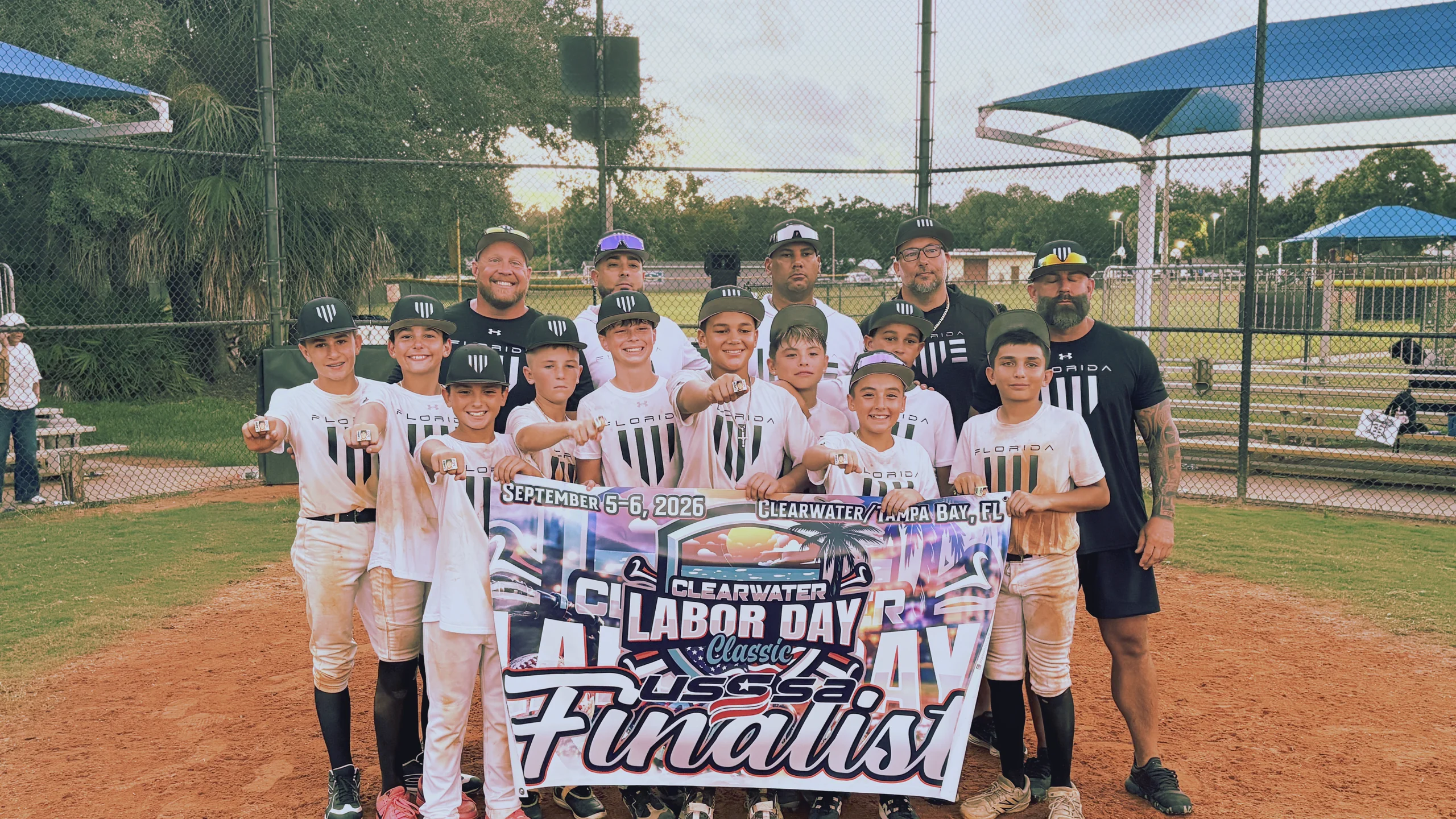 Florida Hype 11U team and coaches holding the USSSA Clearwater Labor Day Classic finalist banner, September 2026