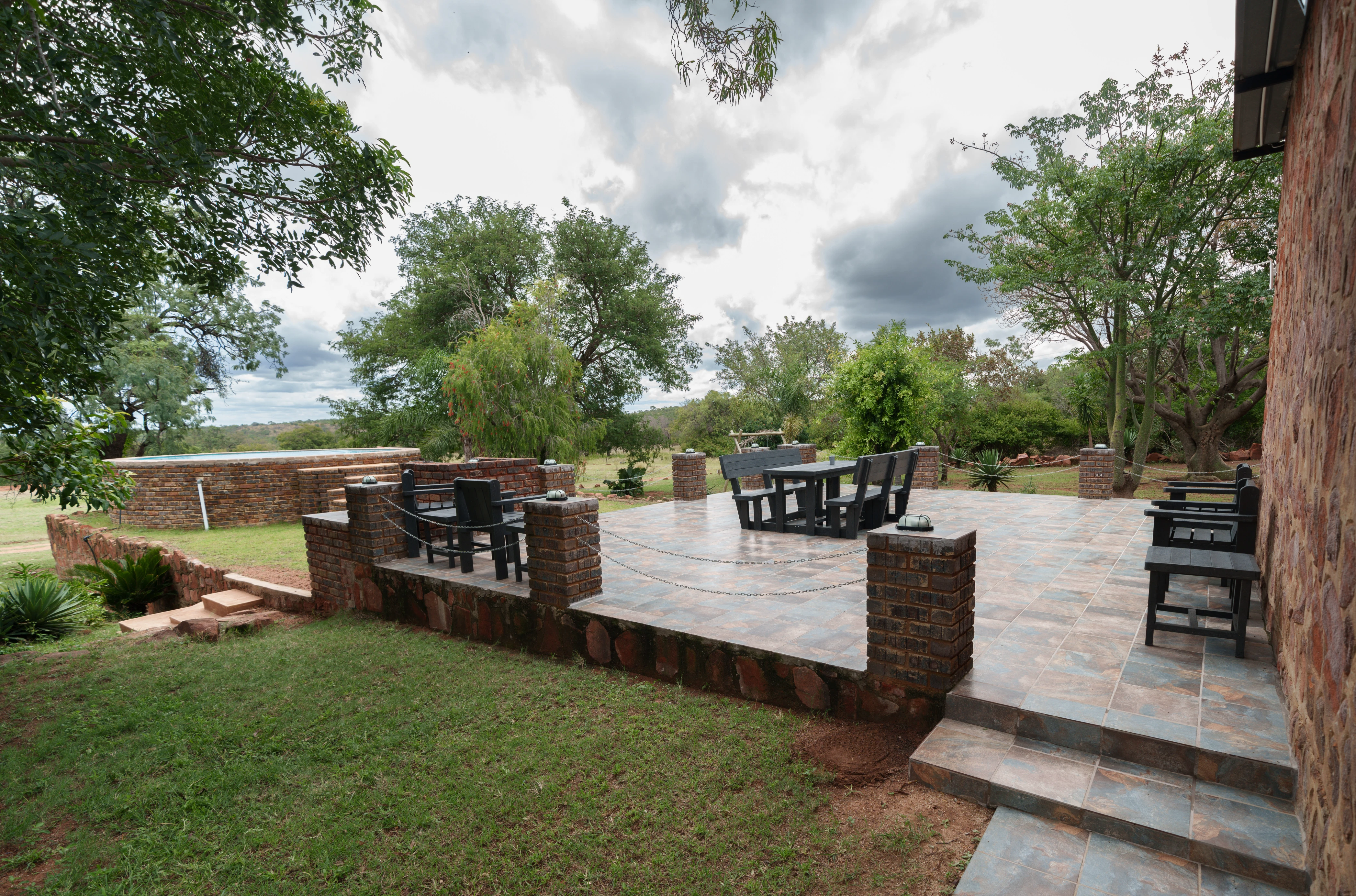 Guests relaxing at Impala Game Ranch outdoor chill area