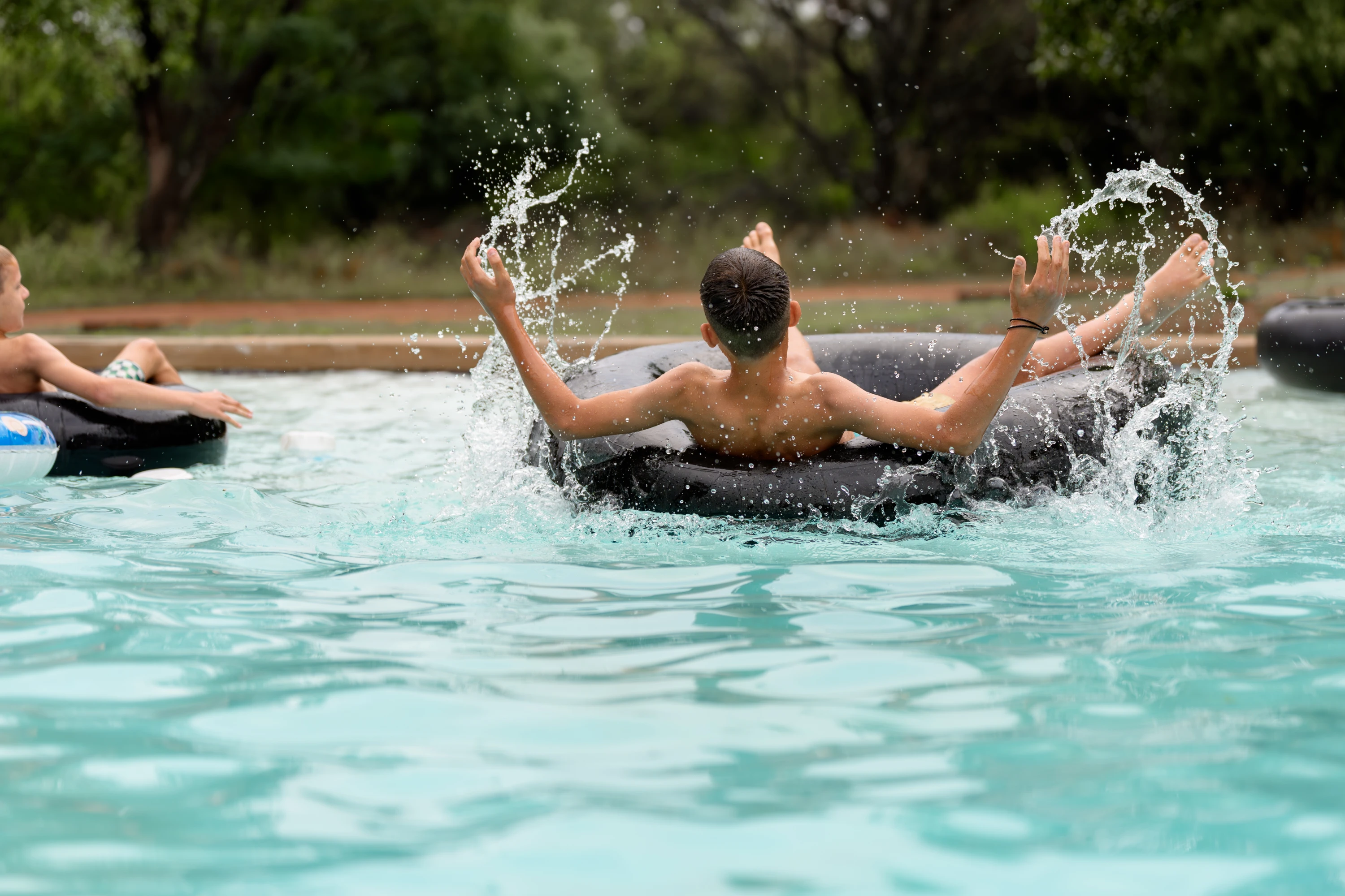 Kids swimming at caravan park