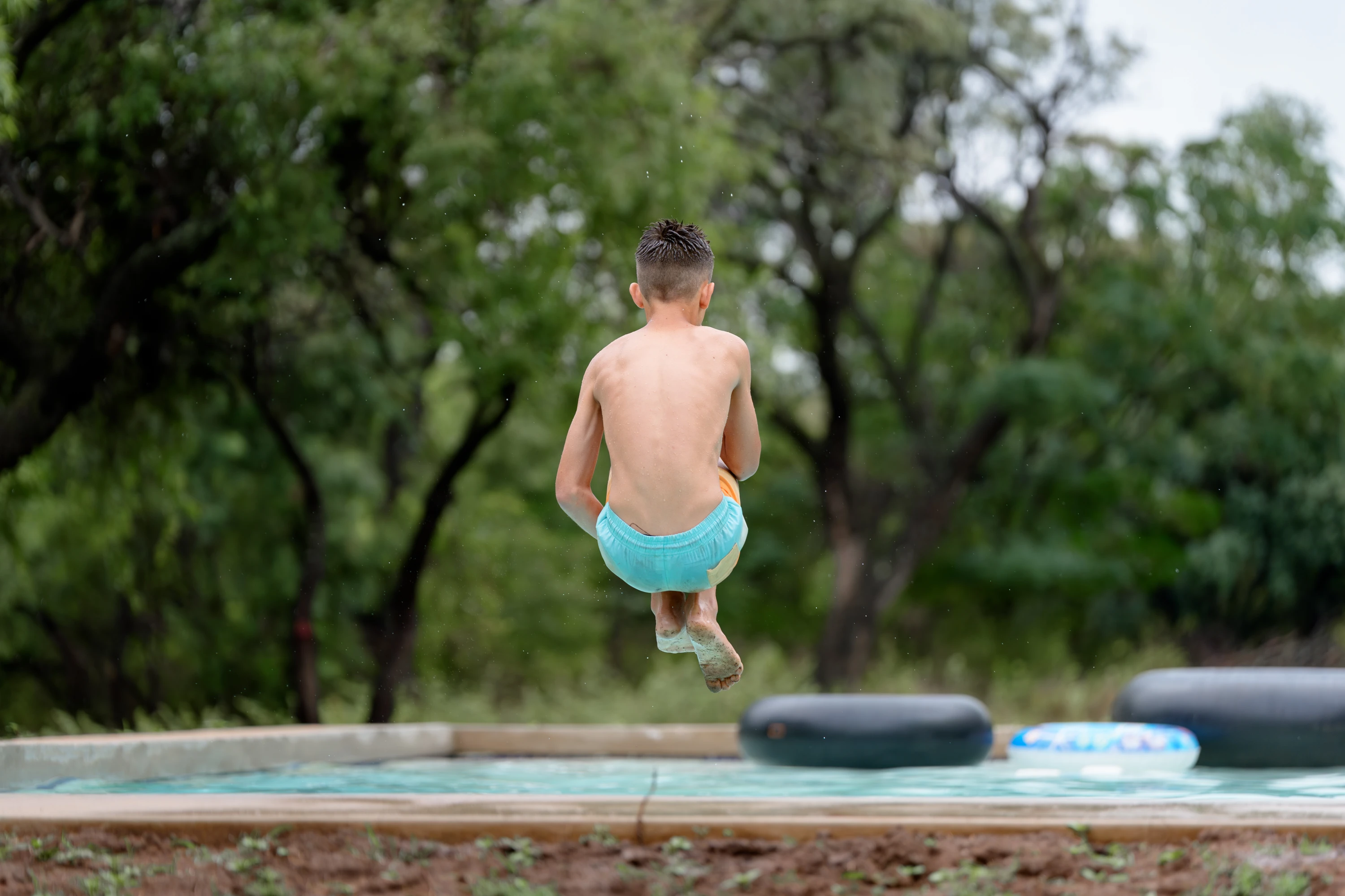 Kids swimming at Impala Game Ranch pool