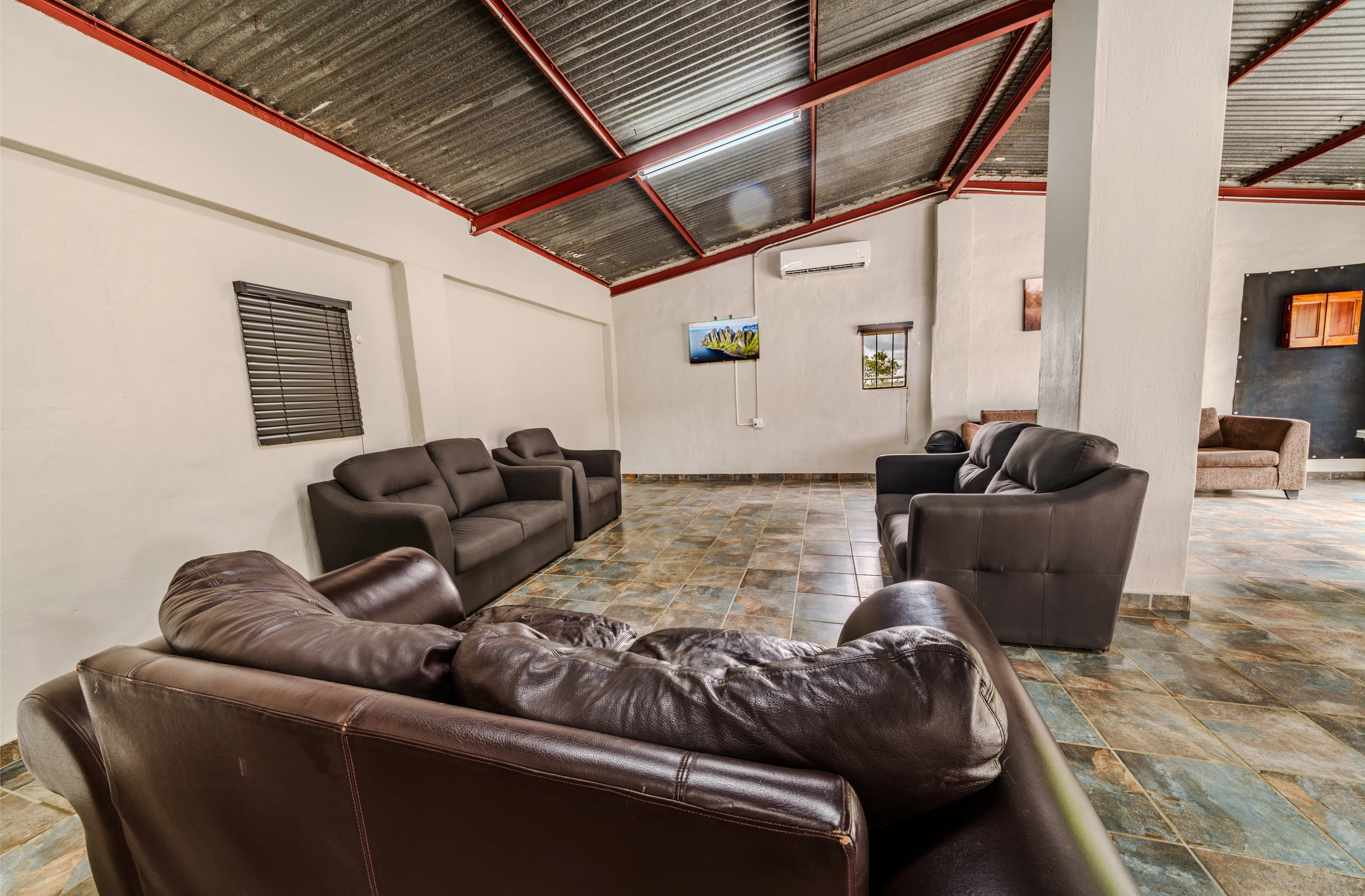 Entertainment area with couches and TV