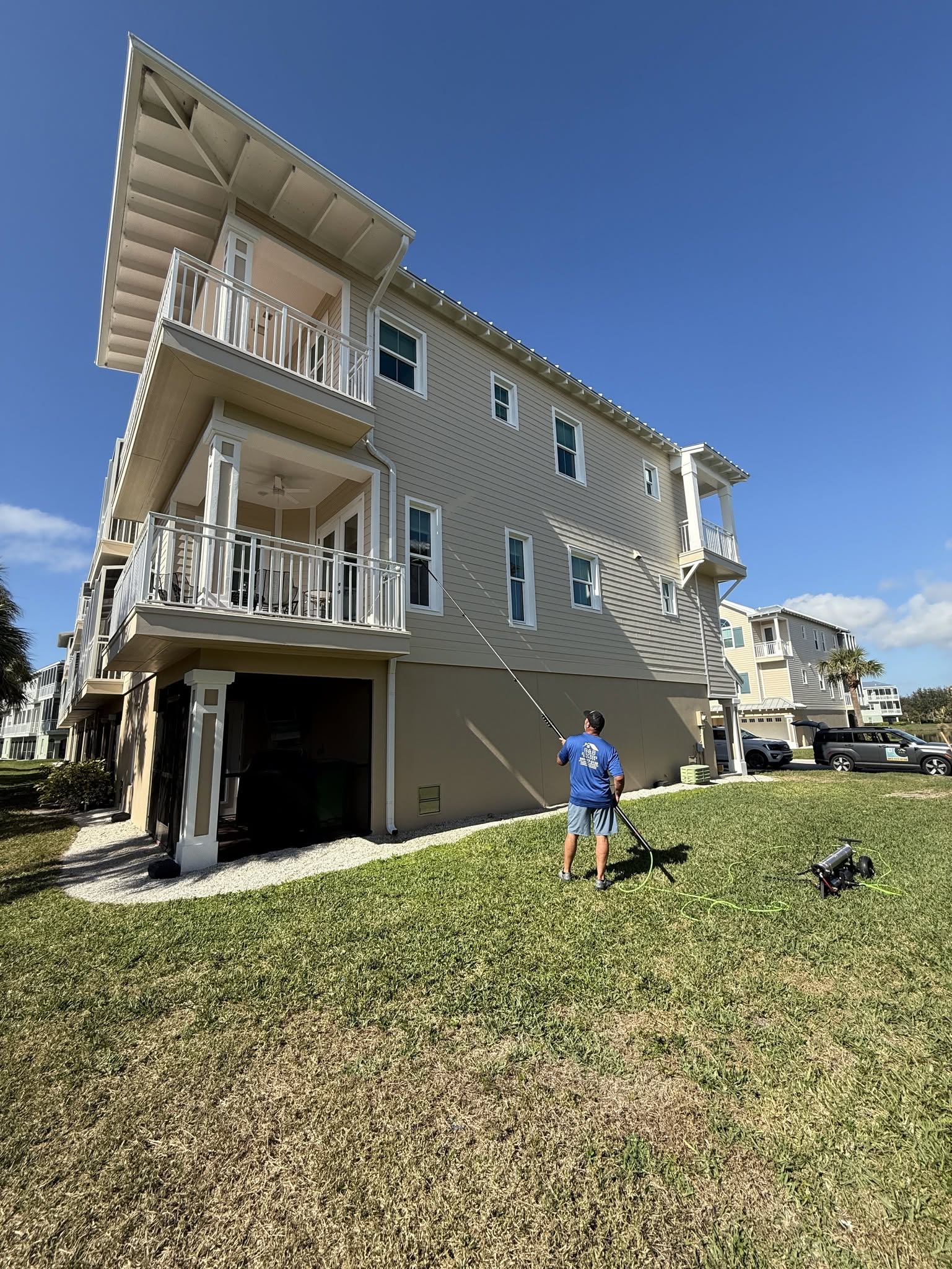 B&B soft washing a two-story Southwest Florida home
