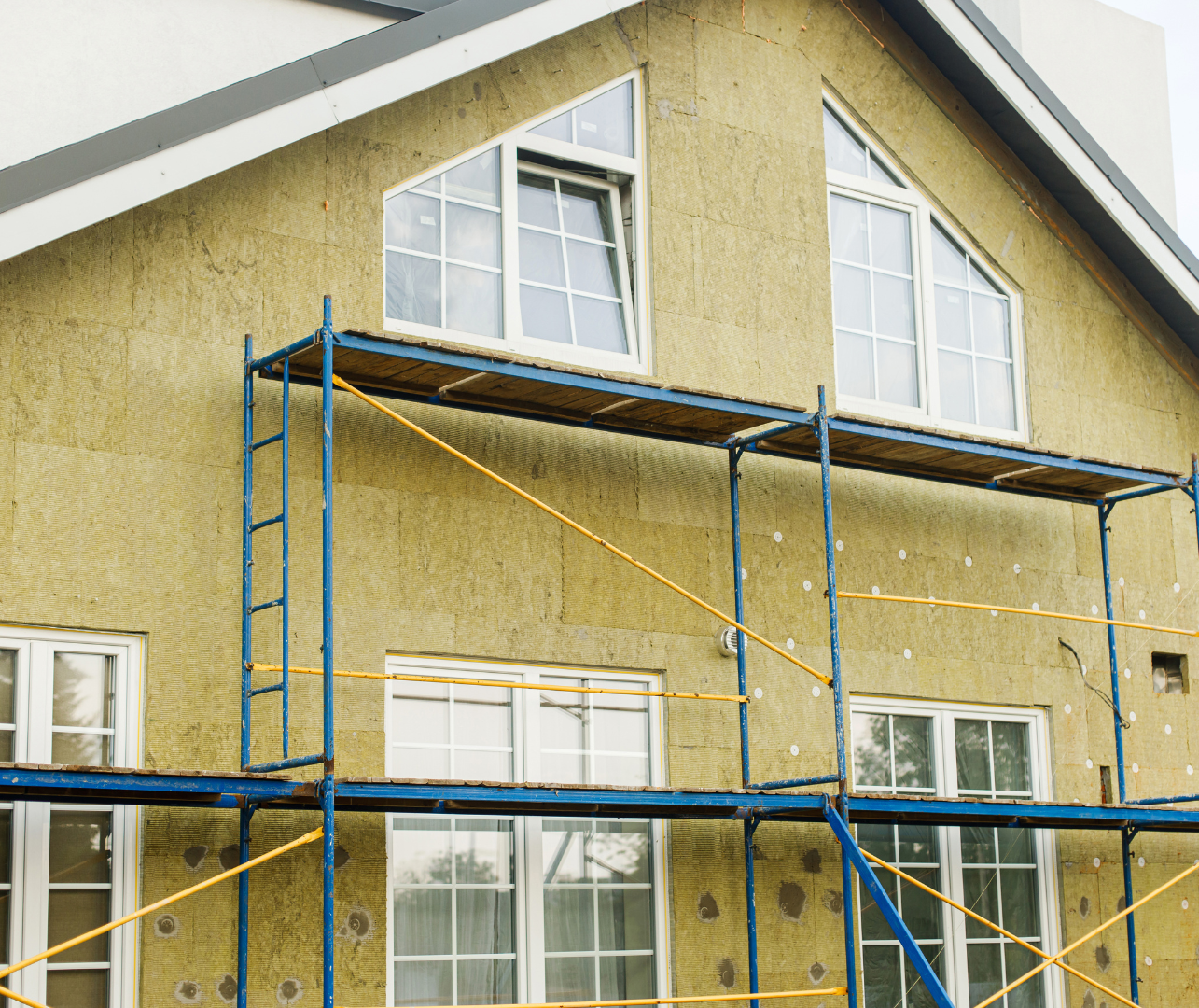 External wall insulation being installed mid-retrofit