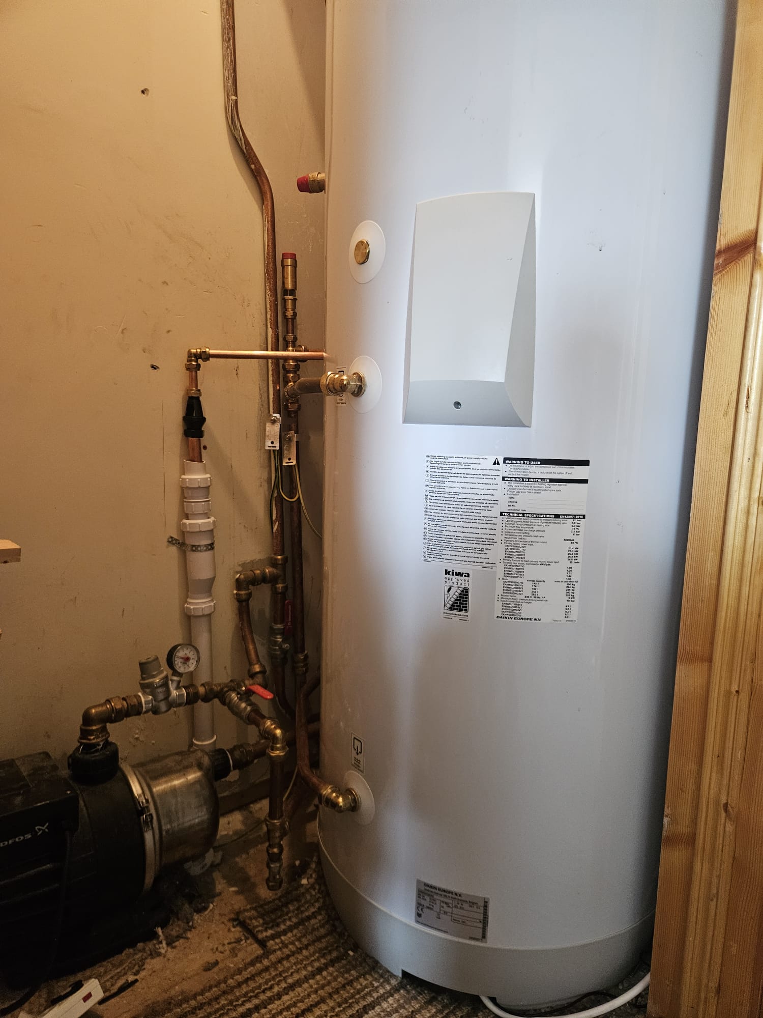 The new Daikin hot water cylinder and pipework installed in Gerry's home