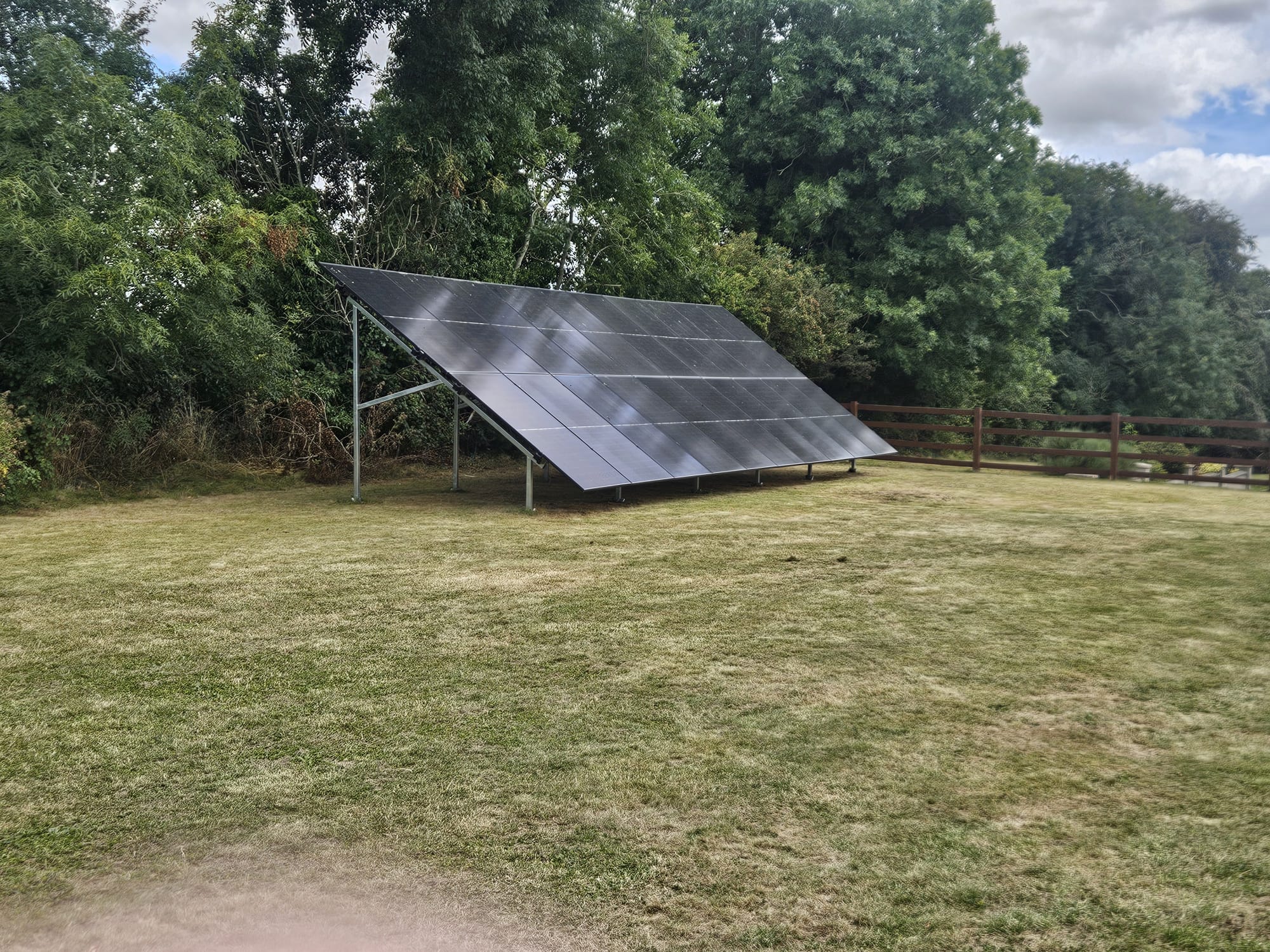 The 9kW ground-mounted solar PV array fitted in Gerry's garden by Lennon Solar three years before the heat pump upgrade