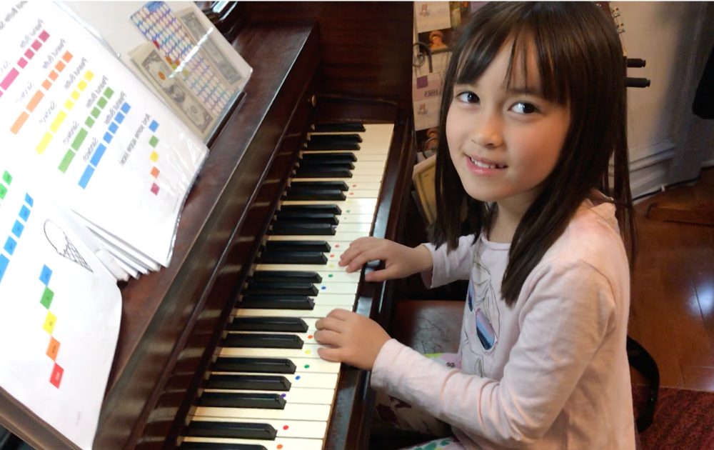 Child playing piano