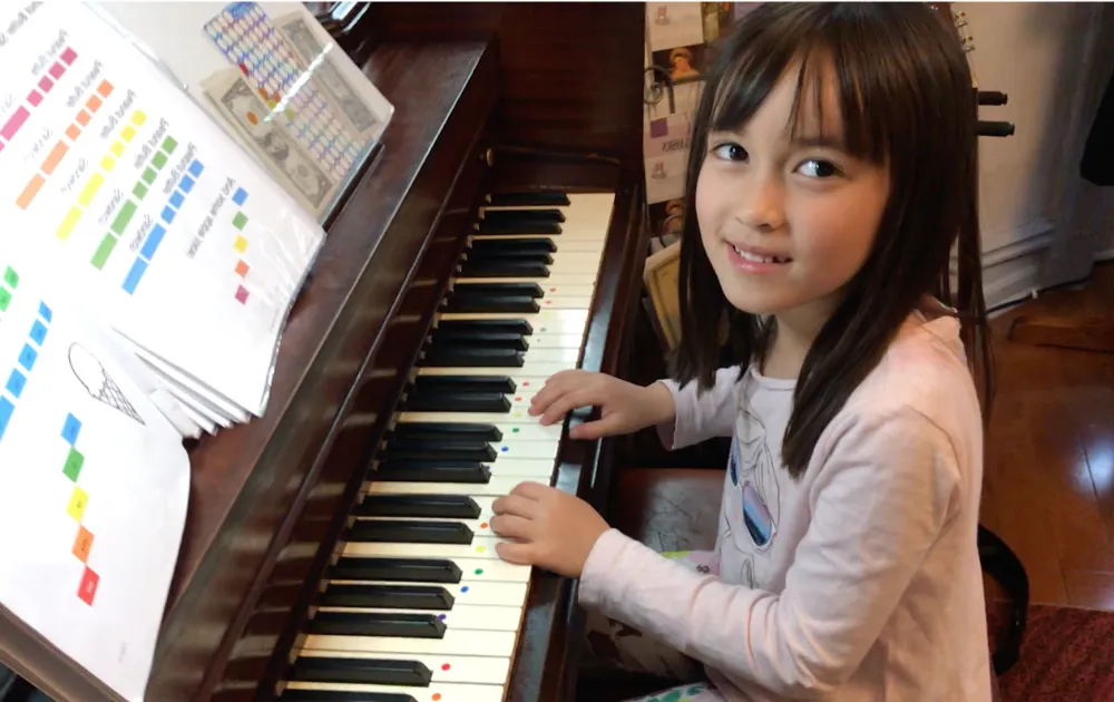 Child playing piano