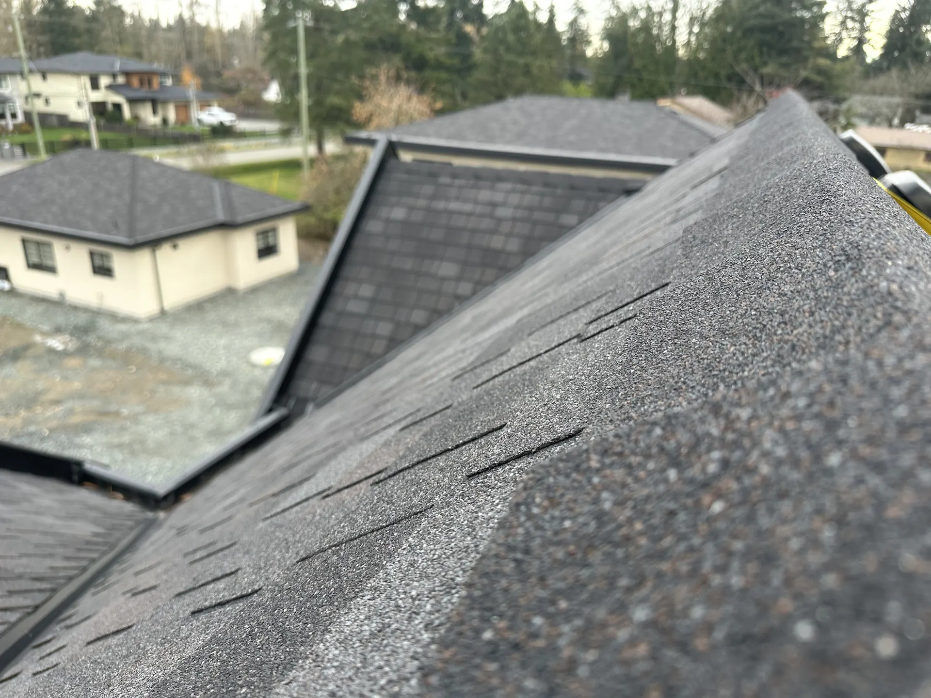 Gutter and fascia installation on a residential roof in Metro Vancouver