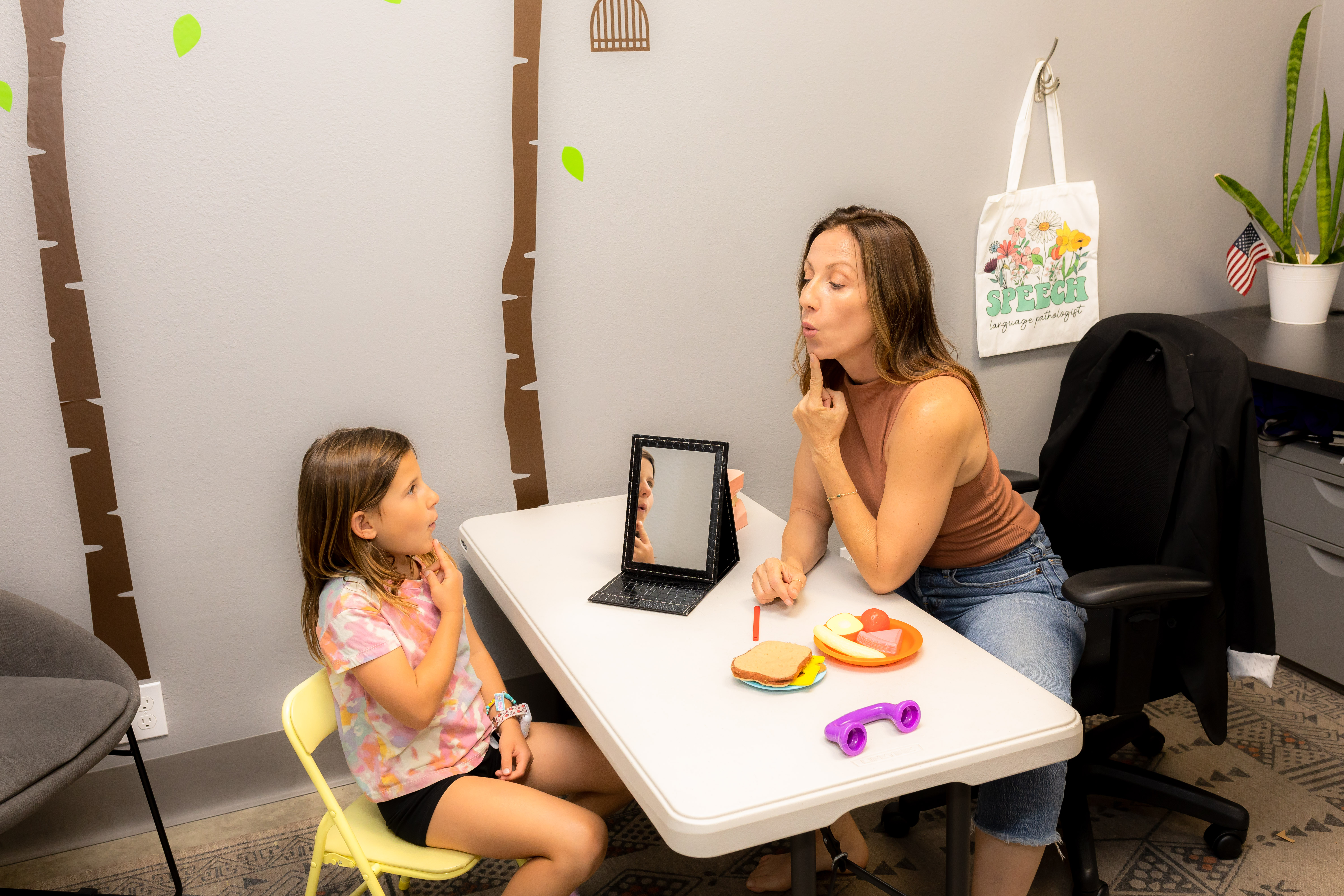 Child participating in a supportive therapy activity