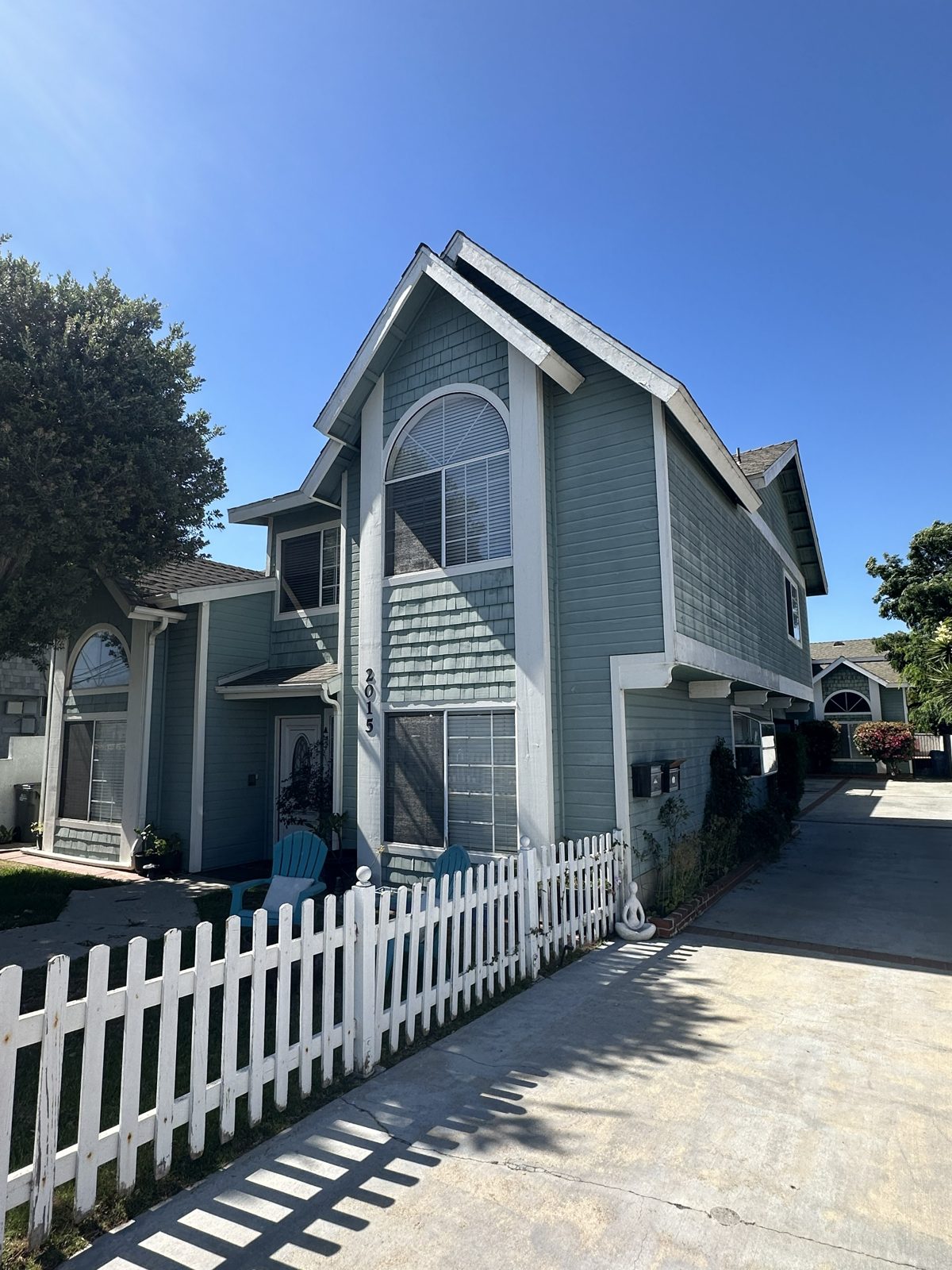 Coastal home exterior with picket fence