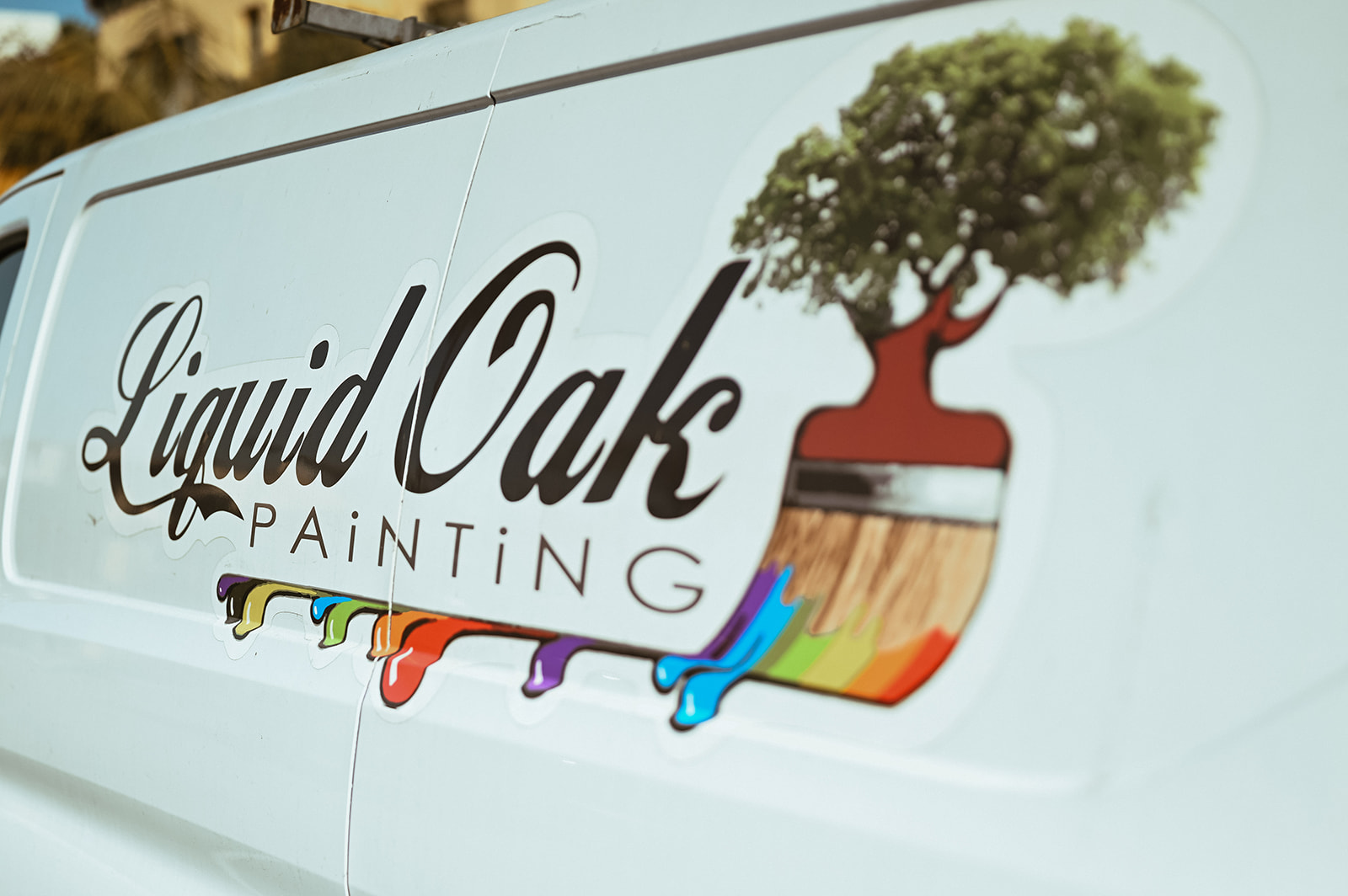 Liquid Oak Painting wrapped van