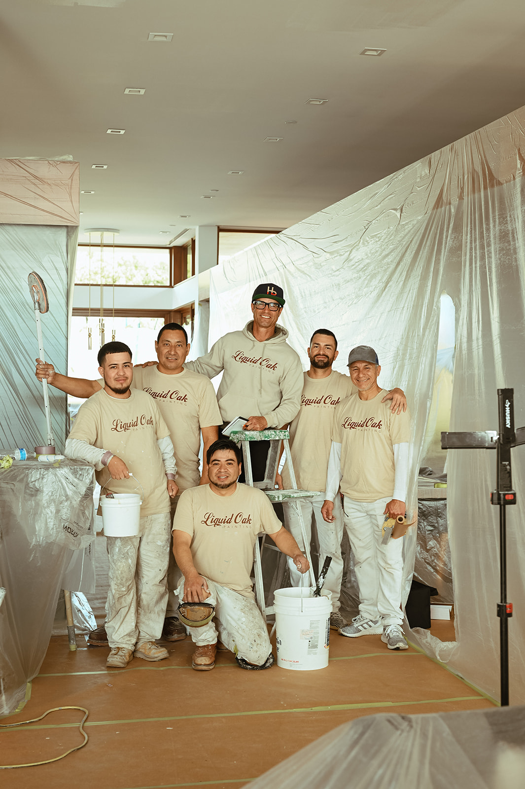 The Liquid Oak Painting crew