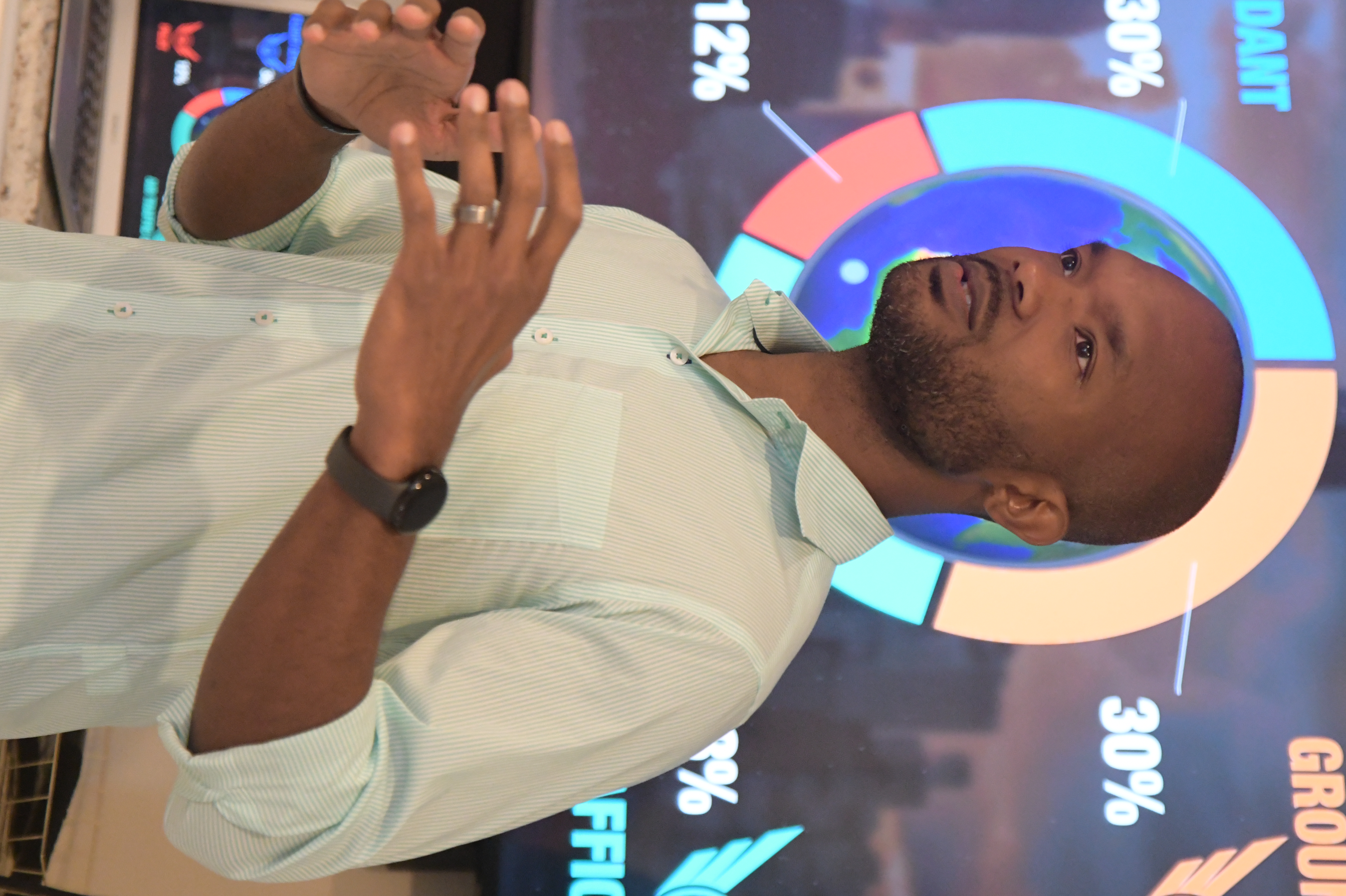 Alonzo speaking to an audience