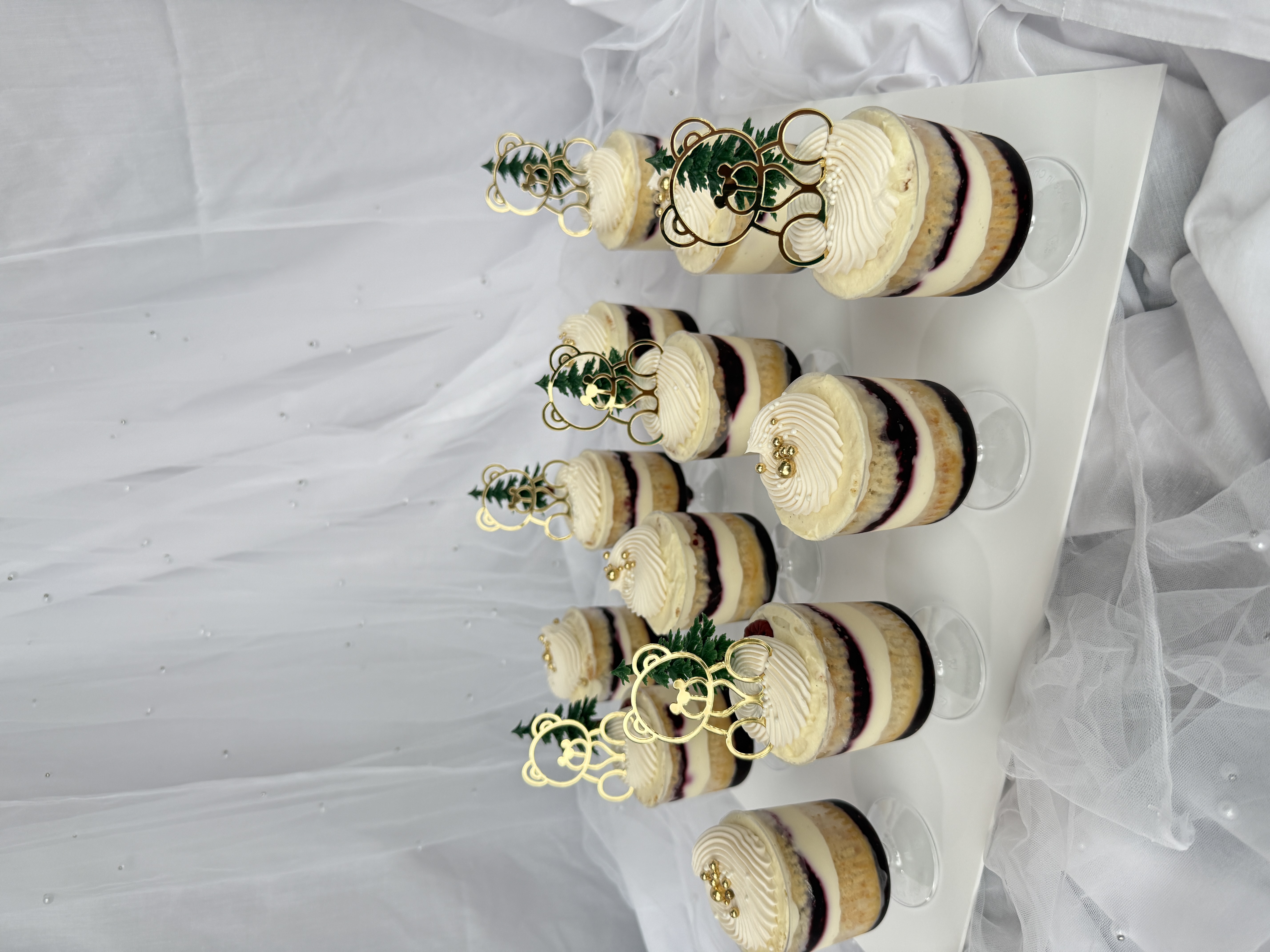 Dessert cups and tarts on a table