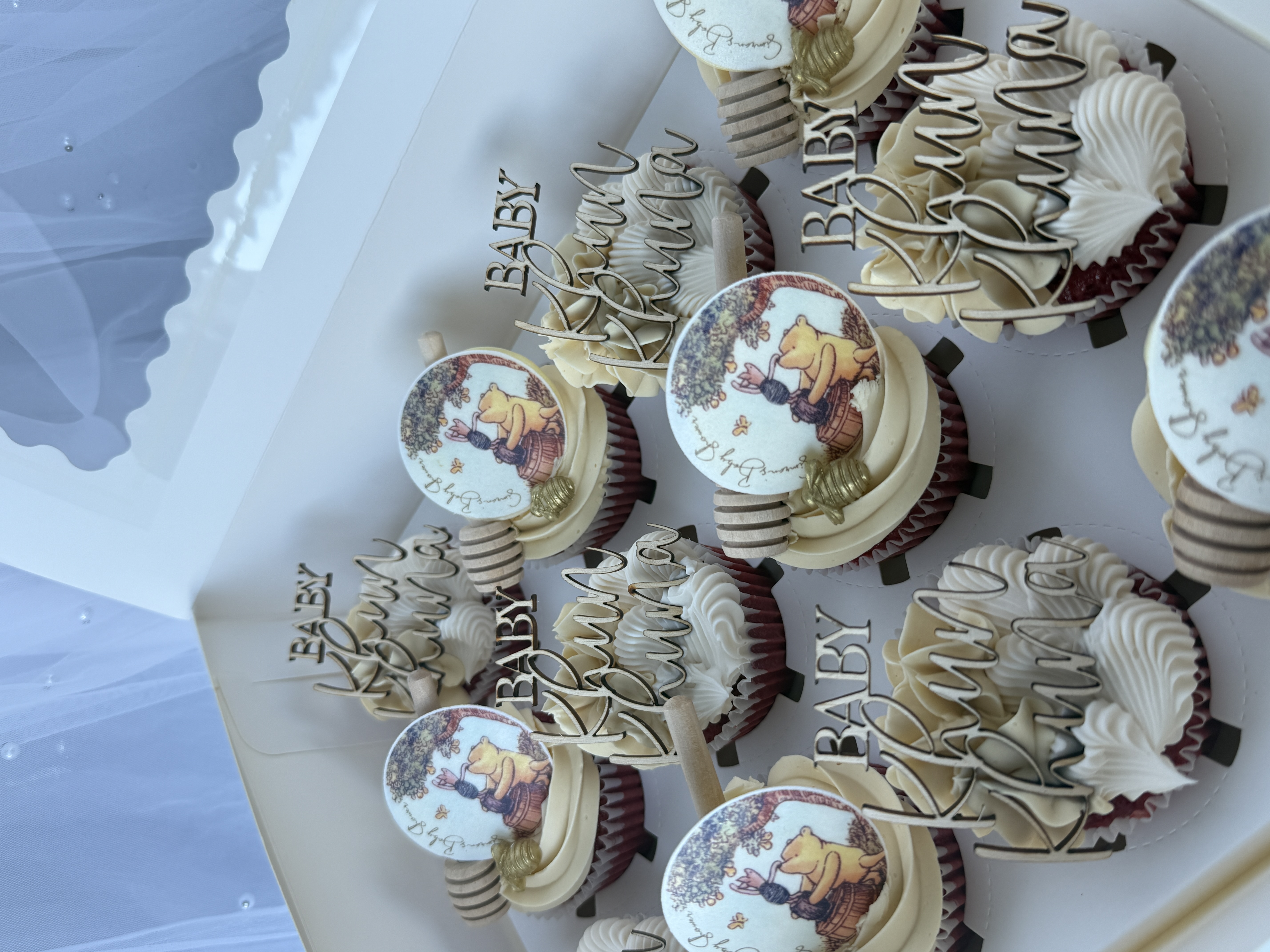 Custom edible cupcake toppers with bee and daisy designs