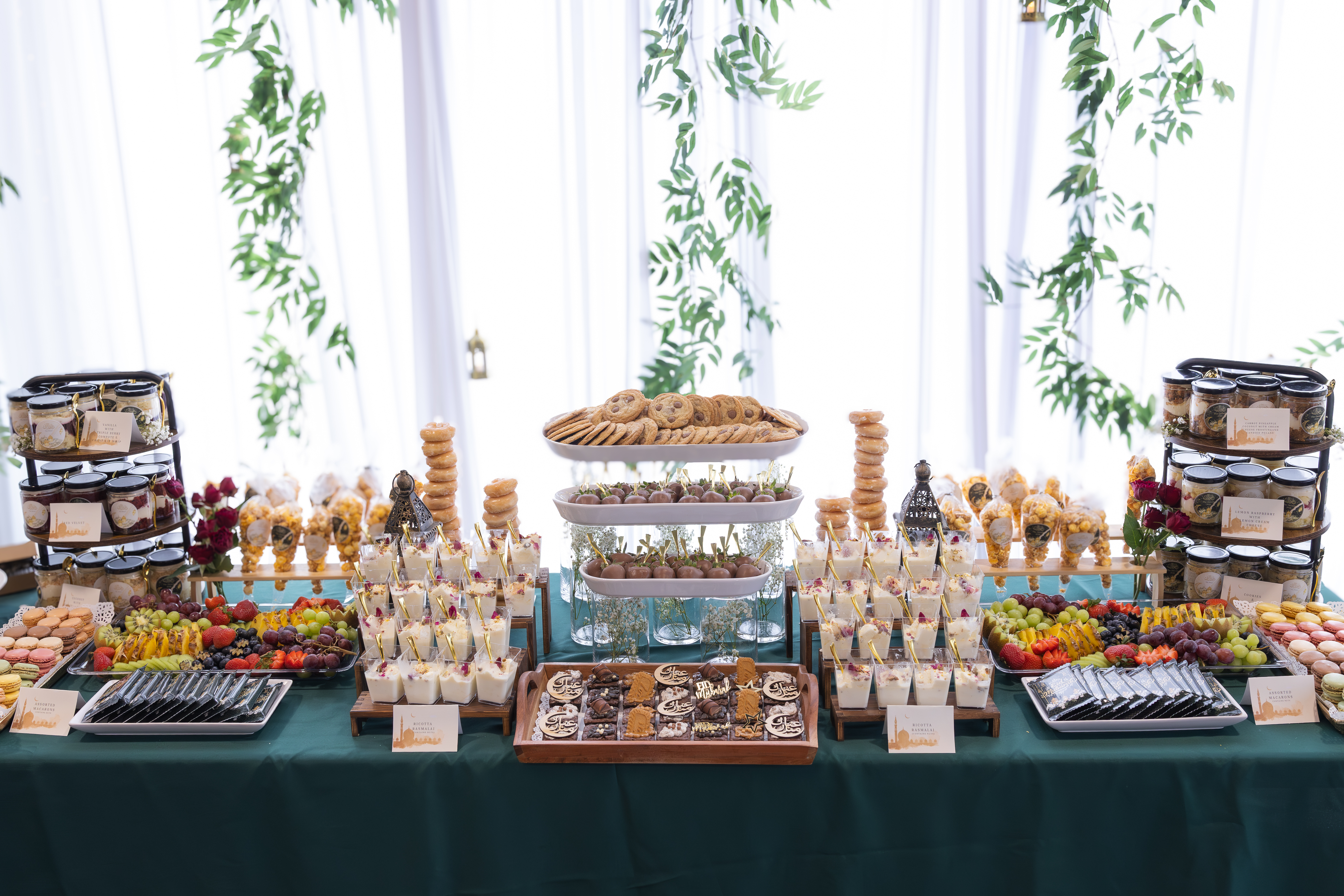 Elegant wedding dessert table in Vancouver with custom themed desserts