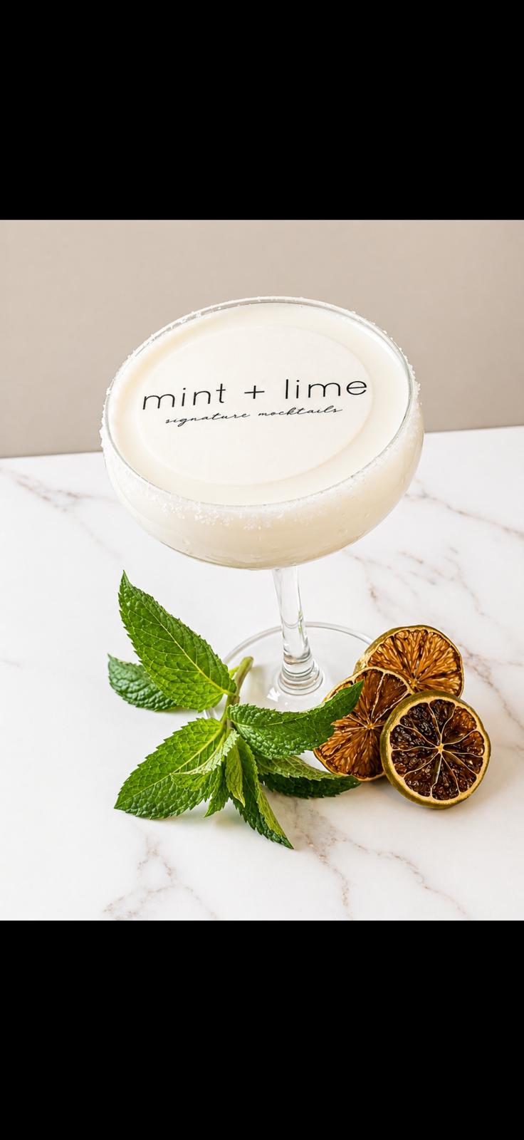 Custom edible cocktail toppers floating on glasses