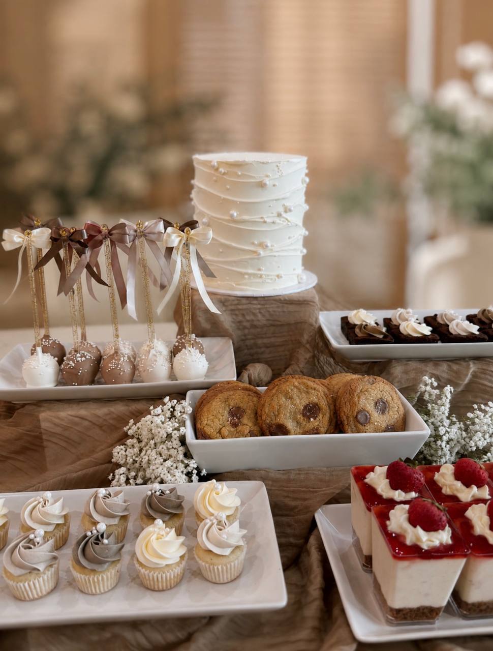 Close detail of custom desserts on a dessert bar