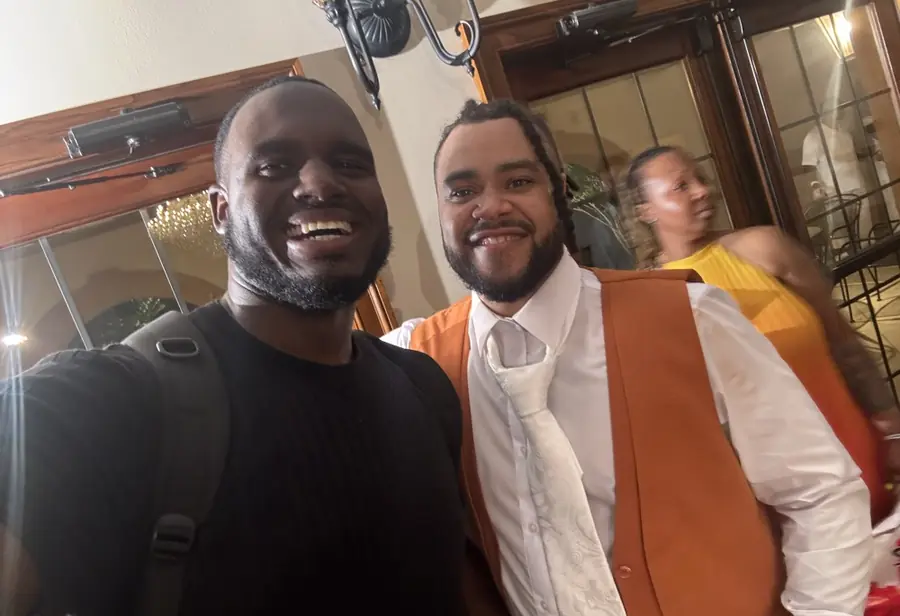 David of D3 Cinema with a groom at the reception