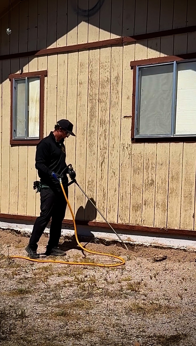 Termite liquid treatment trenching or drilling around foundation