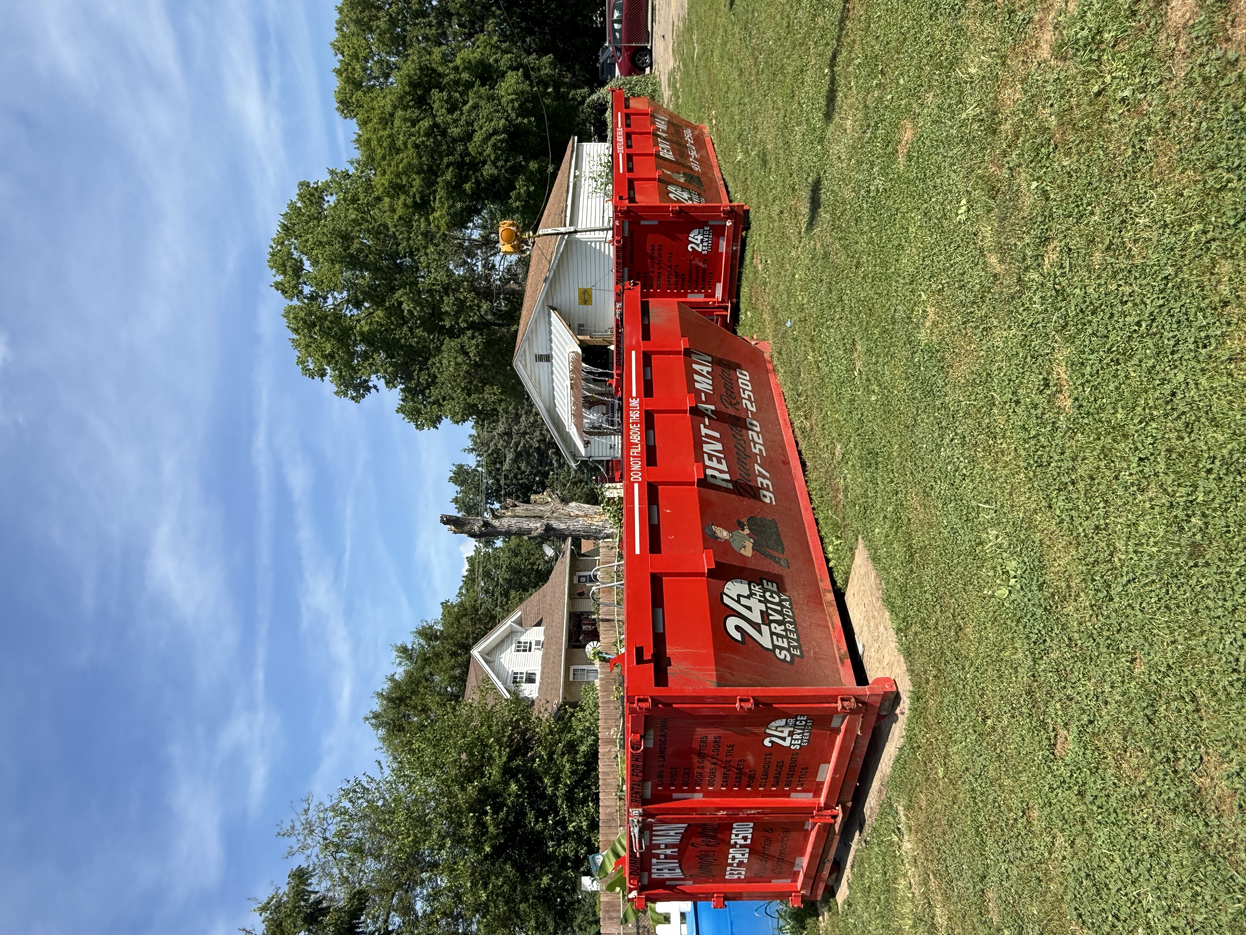 Two Rent-A-Man 14 yard dumpsters side by side in Dayton, Ohio