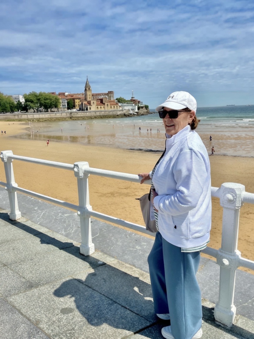 80 year old woman posing near the celtic sea