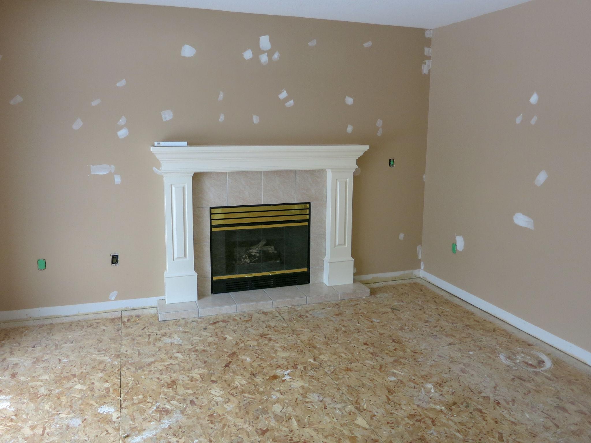 Before: damaged drywall with cracks and holes