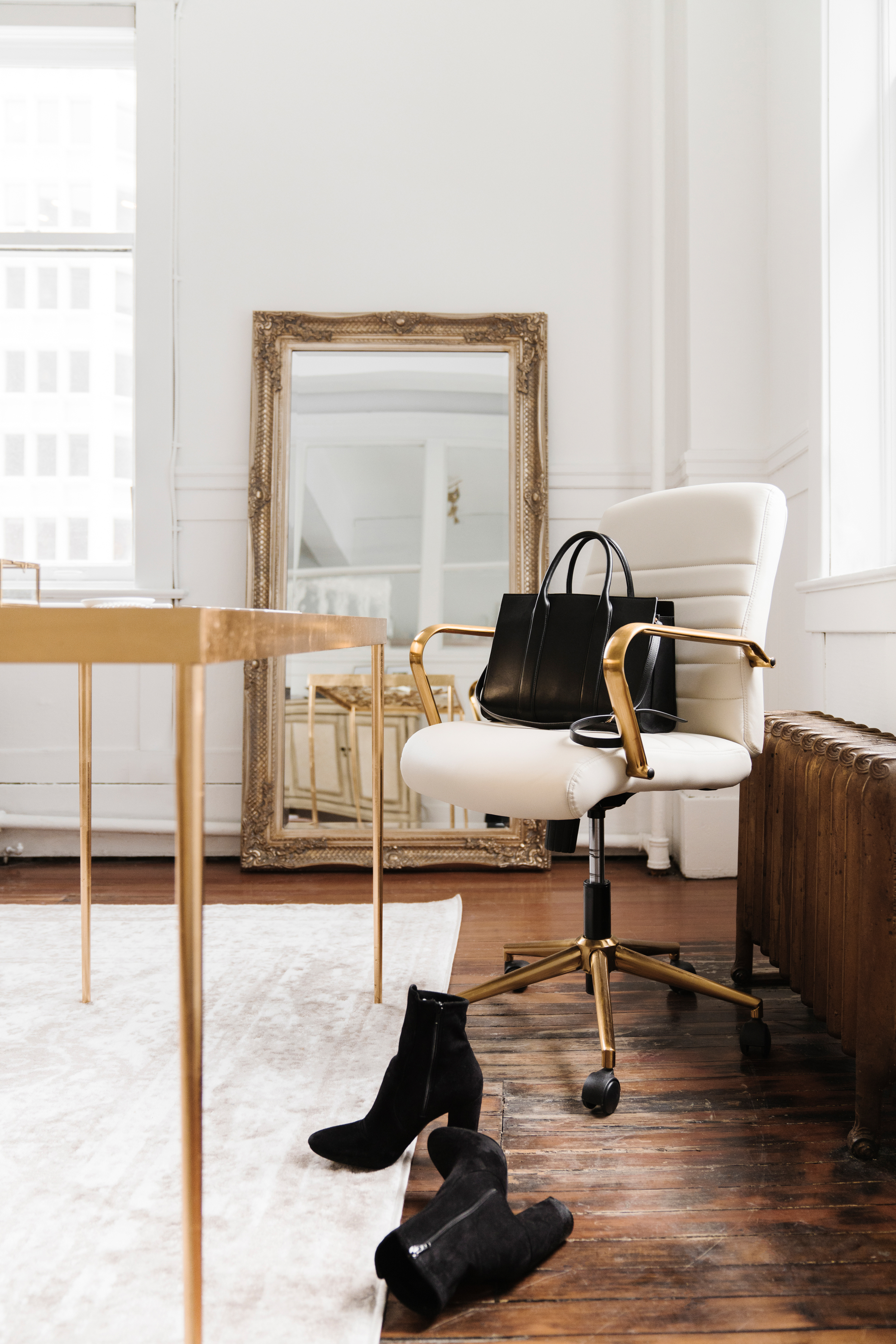 Editorial executive office with white chair and gold details
