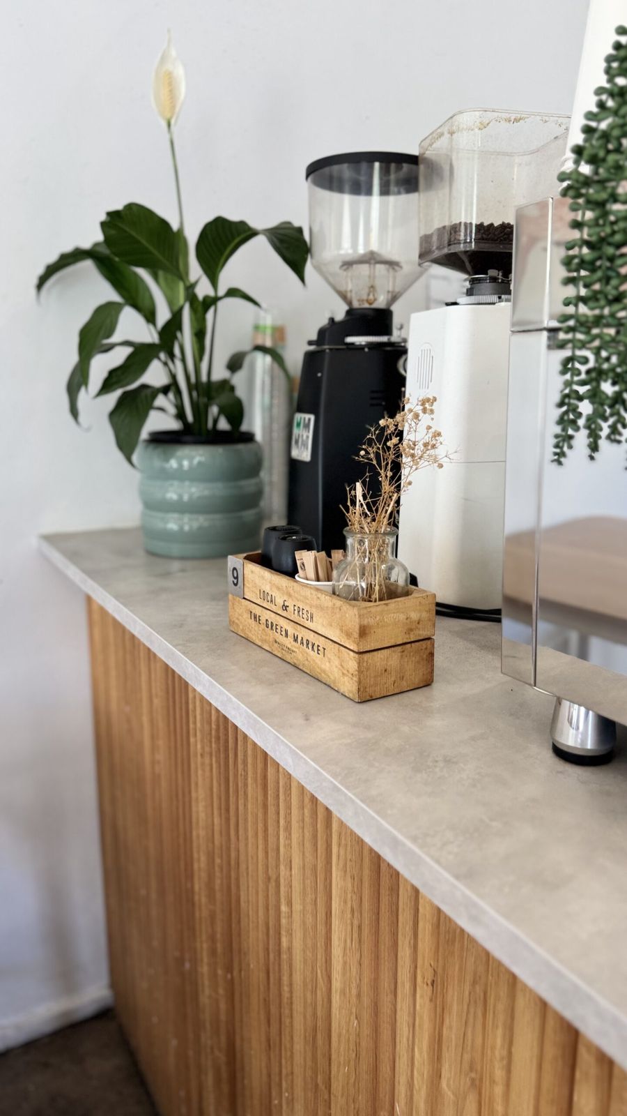 Behind the counter at Akuna