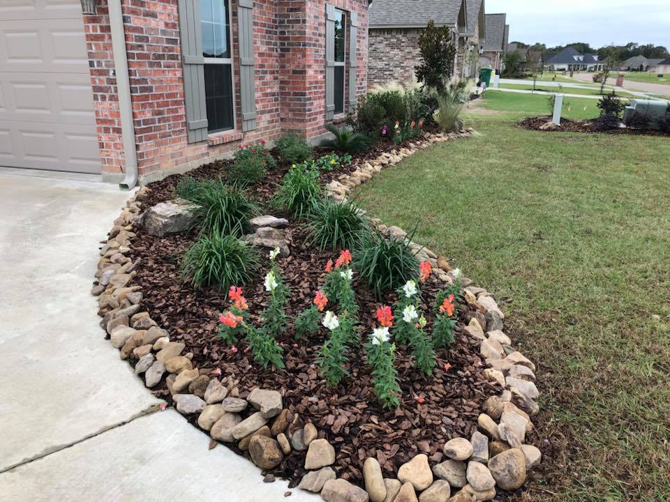 Stone hardscaping and flower bed in Ruston, LA