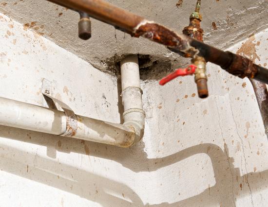 rusty pipes in Pensacola basement