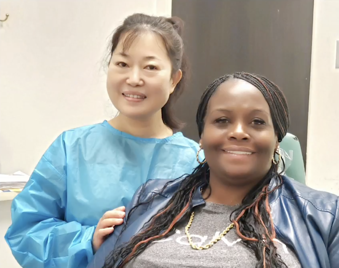 Dr. Zhang with a patient at A to Z Magic Dental