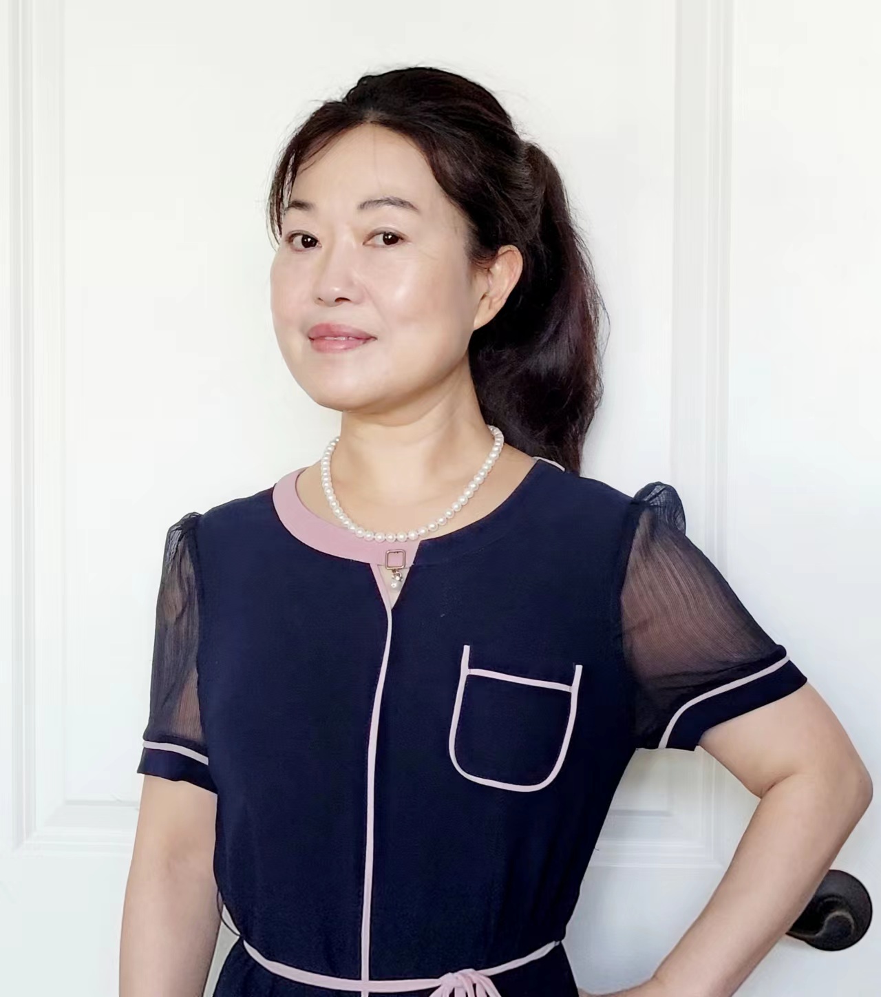 Dr. Liqing Zhang — lead dentist at A to Z Magic Dental in Richton Park and Flossmoor IL