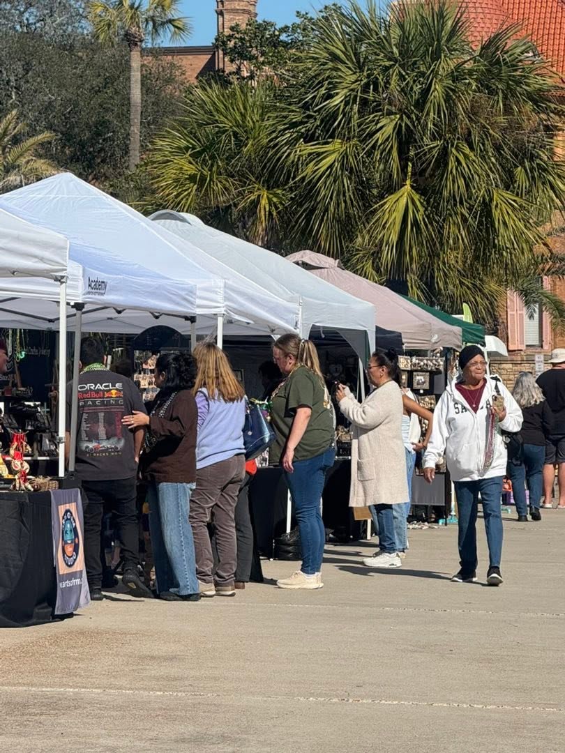 Vendors and shoppers at Galveston Island Market