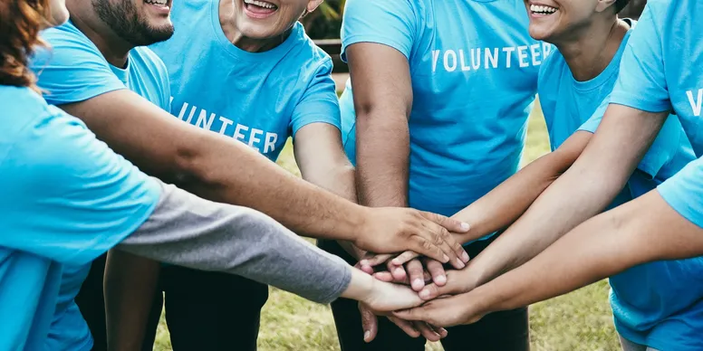 Volunteers helping on market day