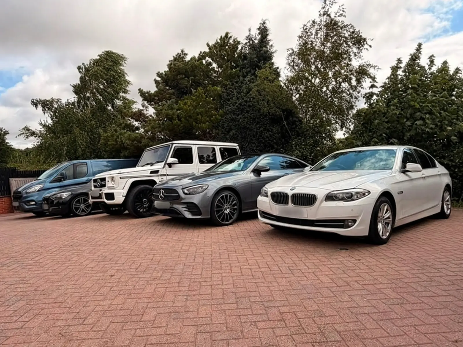 Premium vehicle lineup including G-Wagon, BMW and Mercedes sedans