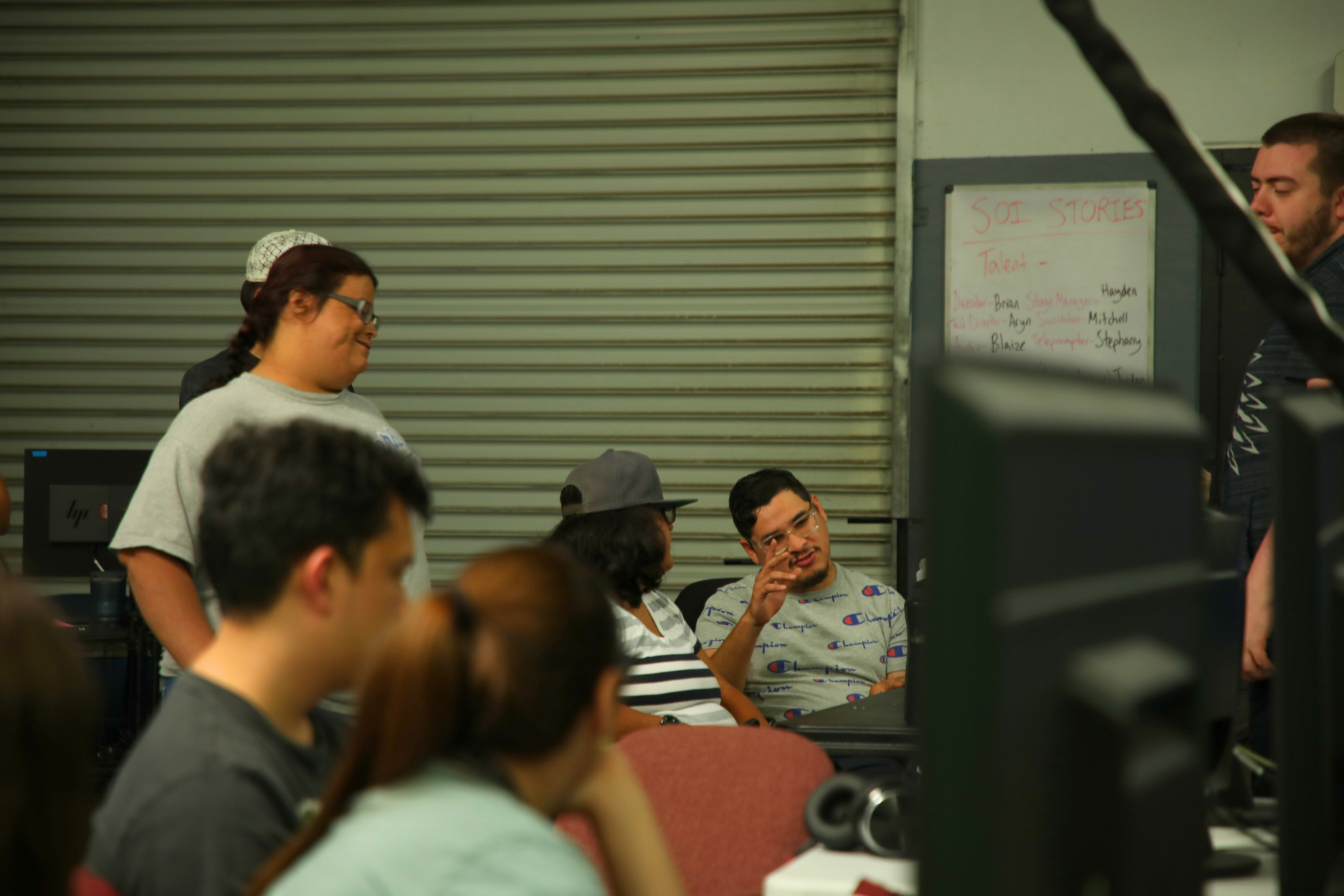 JDS Creative Academy students performing on stage during a community showcase and digital media production class JDS Creative Academy students performing on stage during a community showcase and digital media production class