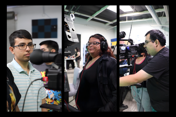 Students collaborating on a digital media project in a JDS Creative Academy classroom