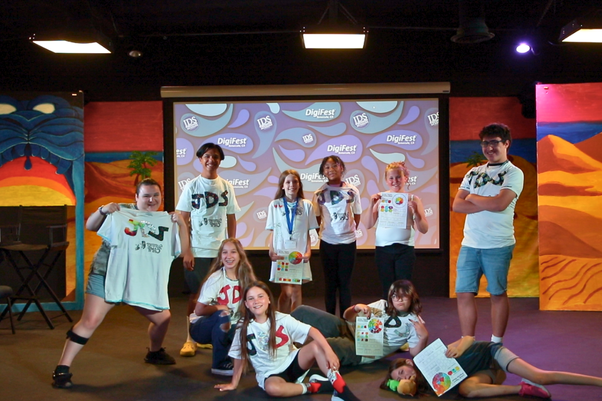 Students participating in creative arts activities, acting, filmmaking, and collaborative projects during summer camp at JDS Creative Academy.