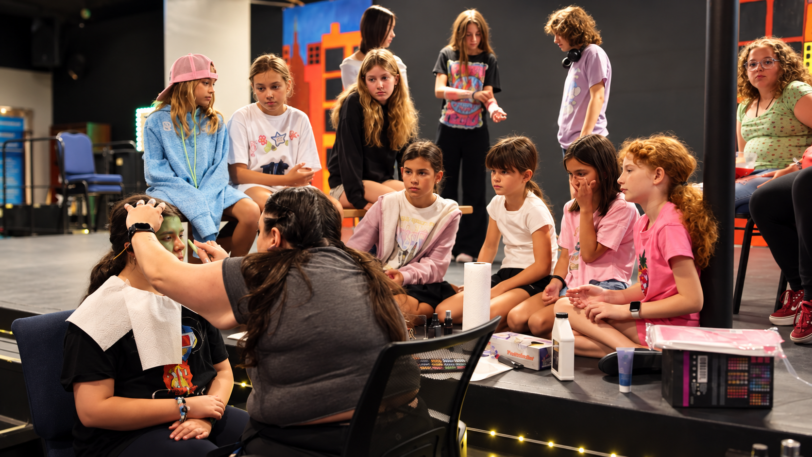 Katie McColm guiding JDS Creative Academy students through a hands-on theatrical makeup demonstration during a performing arts class in Temecula. Katie McColm guiding JDS Creative Academy students through a hands-on theatrical makeup demonstration during a performing arts class in Temecula.