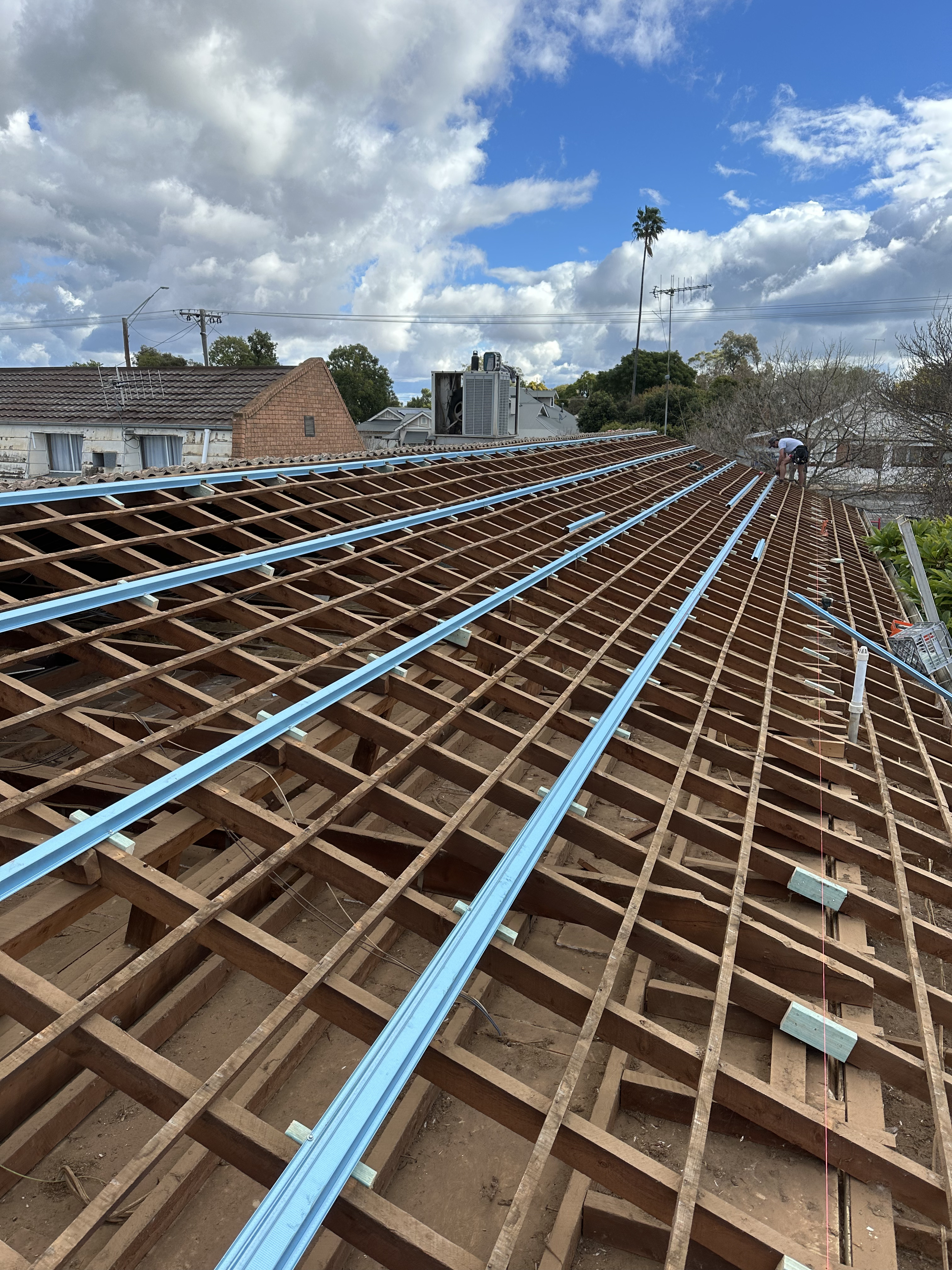 New roof flashing sealed around a penetration on the Narromine home