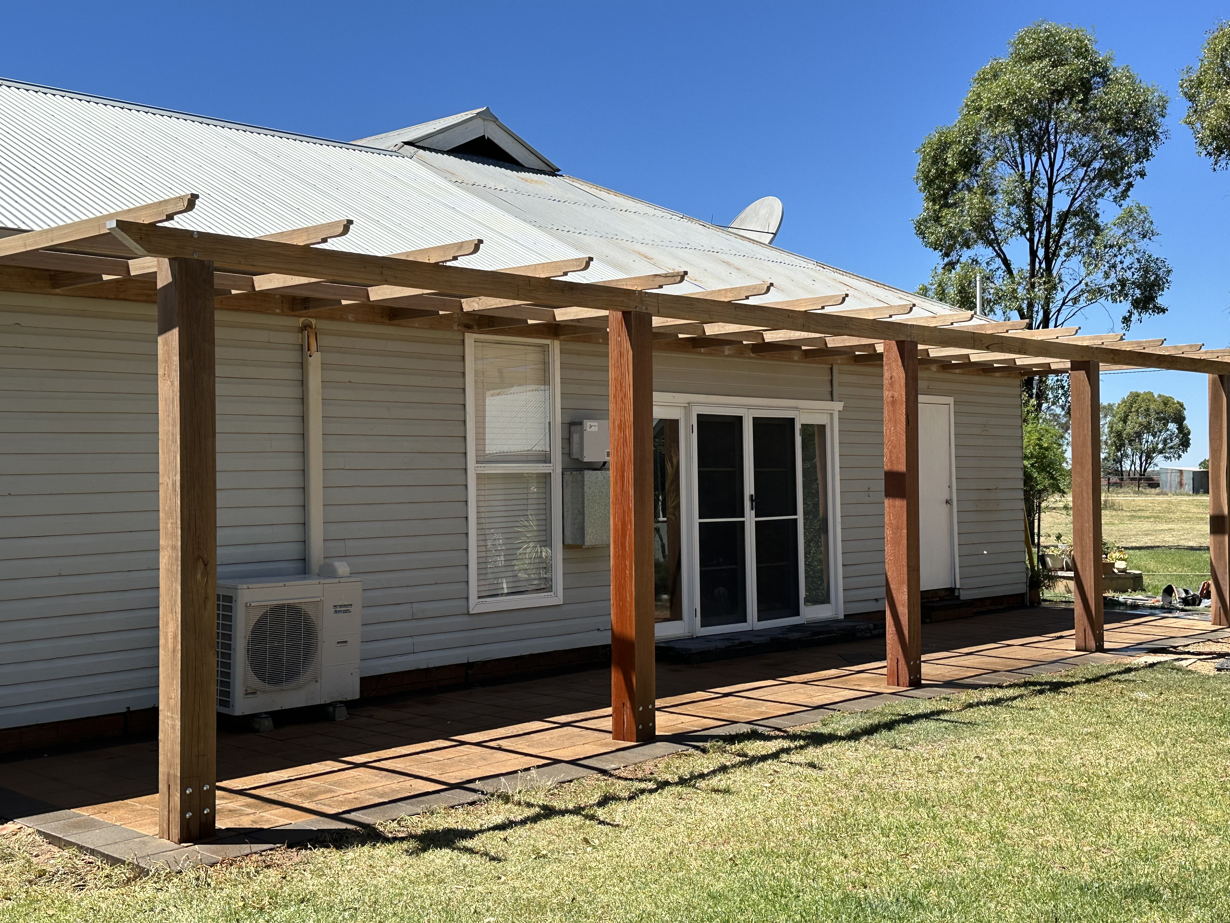 Newly built timber verandah wrapping around the front of a Narromine home