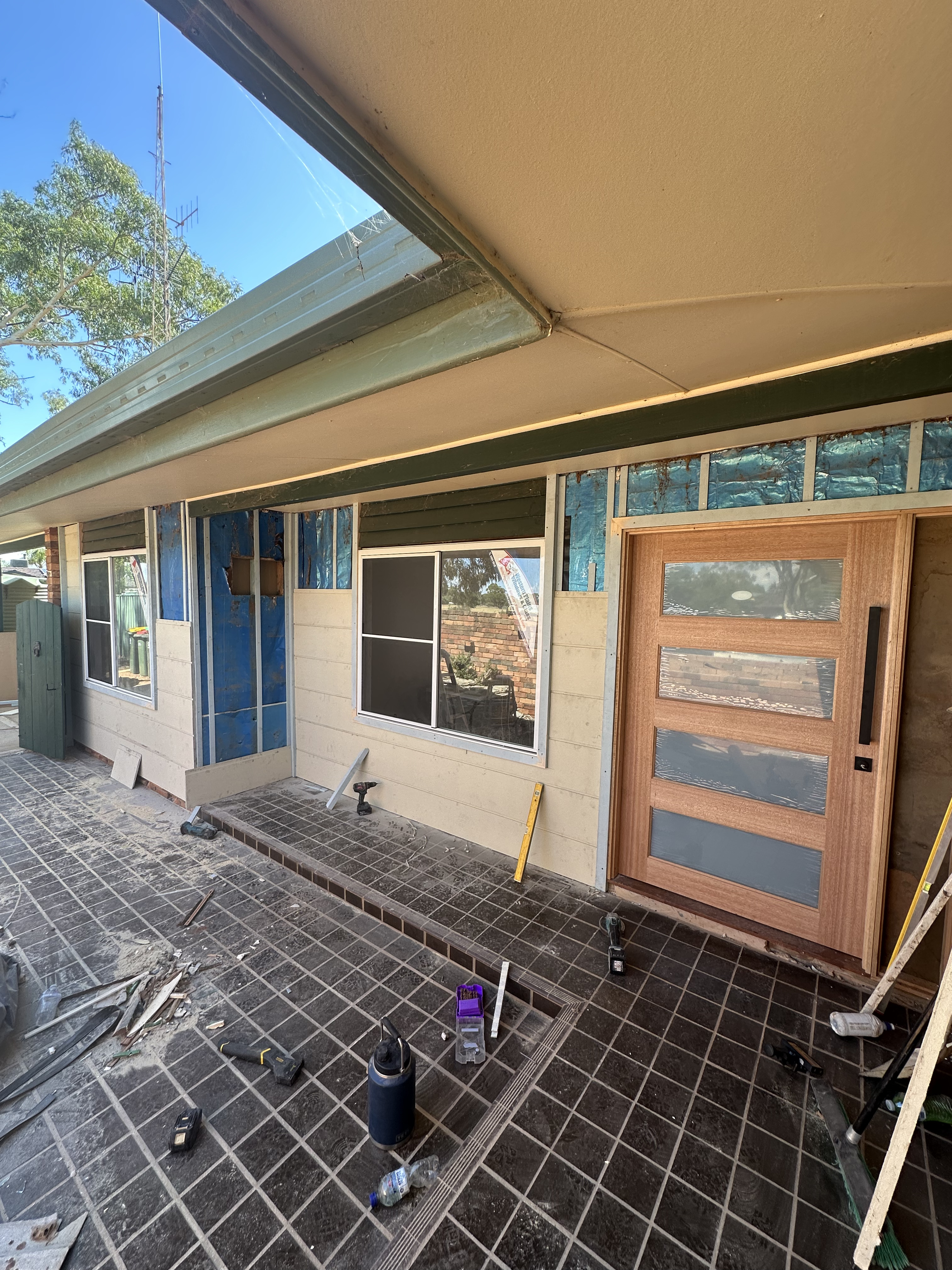 Close-up of neat cladding joins and board detailing on the Trangie home